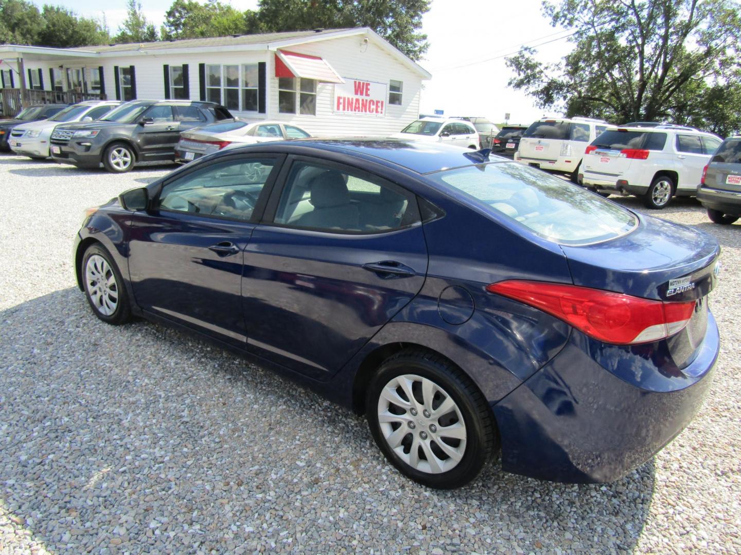 2012 Blue /Gray Hyundai Elantra (5NPDH4AE3CH) with an 4 Cyl engine, Automatic transmission, located at 15016 S Hwy 231, Midland City, AL, 36350, (334) 983-3001, 31.306210, -85.495277 - Photo#5