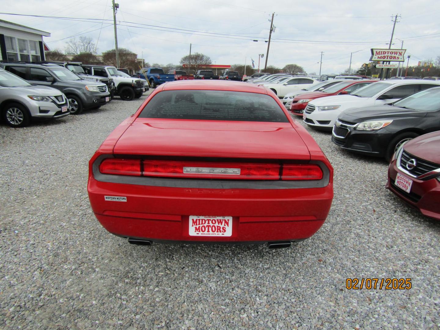 2014 Red /Black Dodge Challenger SXT (2C3CDYAG7EH) with an 6 Cyl engine, Automatic transmission, located at 15016 S Hwy 231, Midland City, AL, 36350, (334) 983-3001, 31.306210, -85.495277 - Photo#6