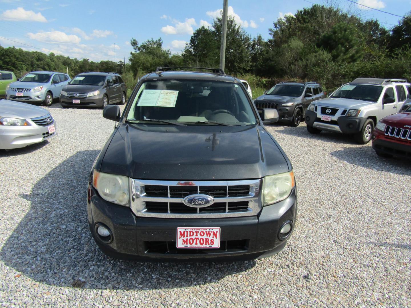 2009 Gray /Gray Ford Escape XLT FWD I4 (1FMCU037X9K) with an 4 Cyl engine, Automatic transmission, located at 15016 S Hwy 231, Midland City, AL, 36350, (334) 983-3001, 31.306210, -85.495277 - Photo#1