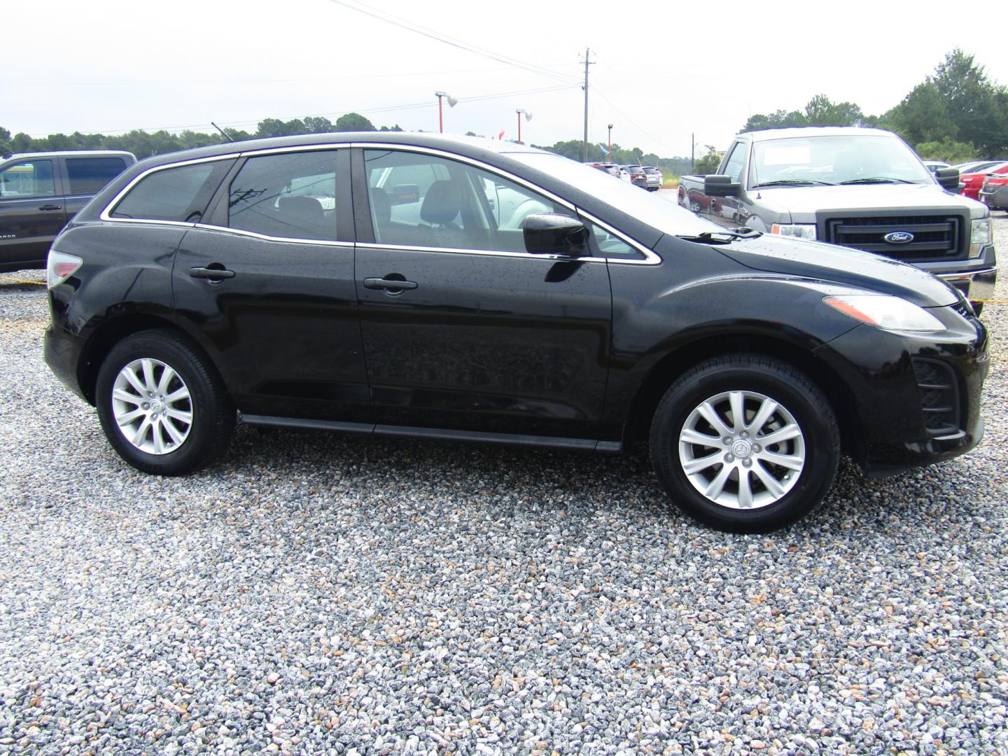 2011 Black /BLACK Mazda CX-7 i SV (JM3ER2A56B0) with an 2.5L L4 DOHC 16V engine, Automatic transmission, located at 15016 S Hwy 231, Midland City, AL, 36350, (334) 983-3001, 31.306210, -85.495277 - Photo#0