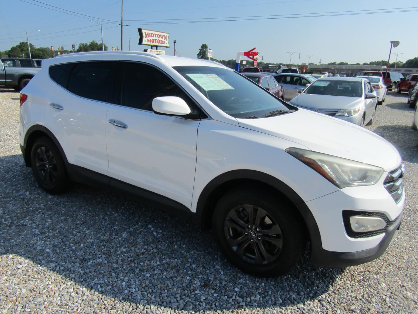 2014 White /Tan Hyundai Santa Fe Sport 2.4 FWD (5XYZU3LB5EG) with an 2.4L L4 DOHC 16V engine, Automatic transmission, located at 15016 S Hwy 231, Midland City, AL, 36350, (334) 983-3001, 31.306210, -85.495277 - Photo#0