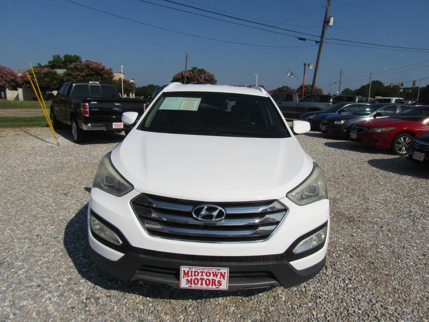 2014 White /Tan Hyundai Santa Fe Sport 2.4 FWD (5XYZU3LB5EG) with an 2.4L L4 DOHC 16V engine, Automatic transmission, located at 15016 S Hwy 231, Midland City, AL, 36350, (334) 983-3001, 31.306210, -85.495277 - Photo#1