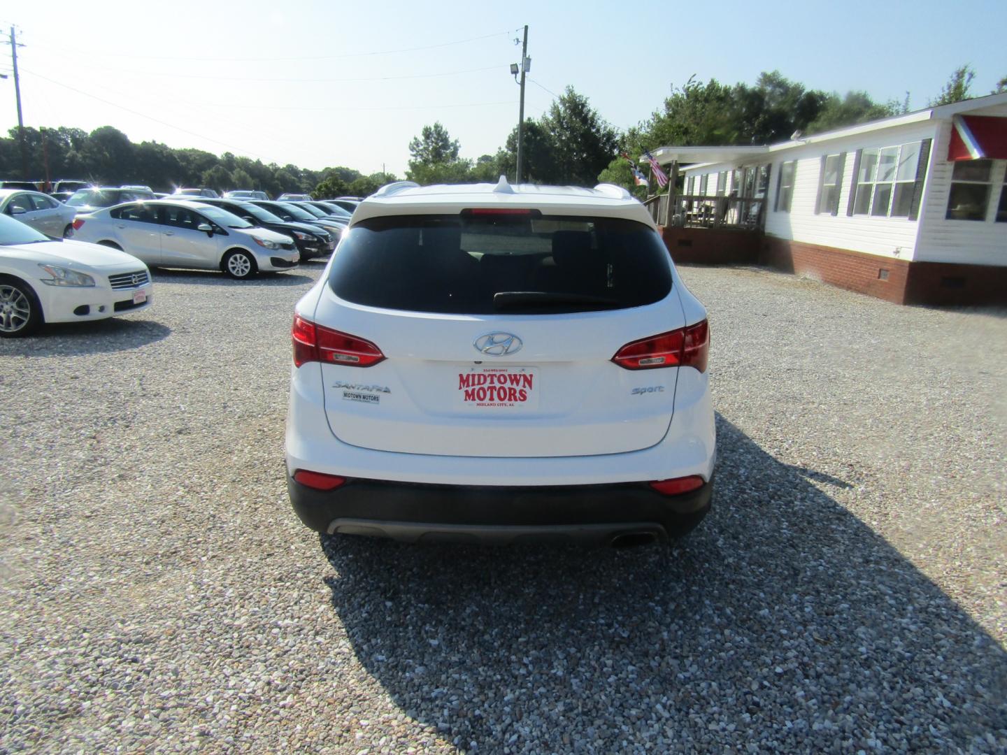 2014 White /Tan Hyundai Santa Fe Sport 2.4 FWD (5XYZU3LB5EG) with an 2.4L L4 DOHC 16V engine, Automatic transmission, located at 15016 S Hwy 231, Midland City, AL, 36350, (334) 983-3001, 31.306210, -85.495277 - Photo#6