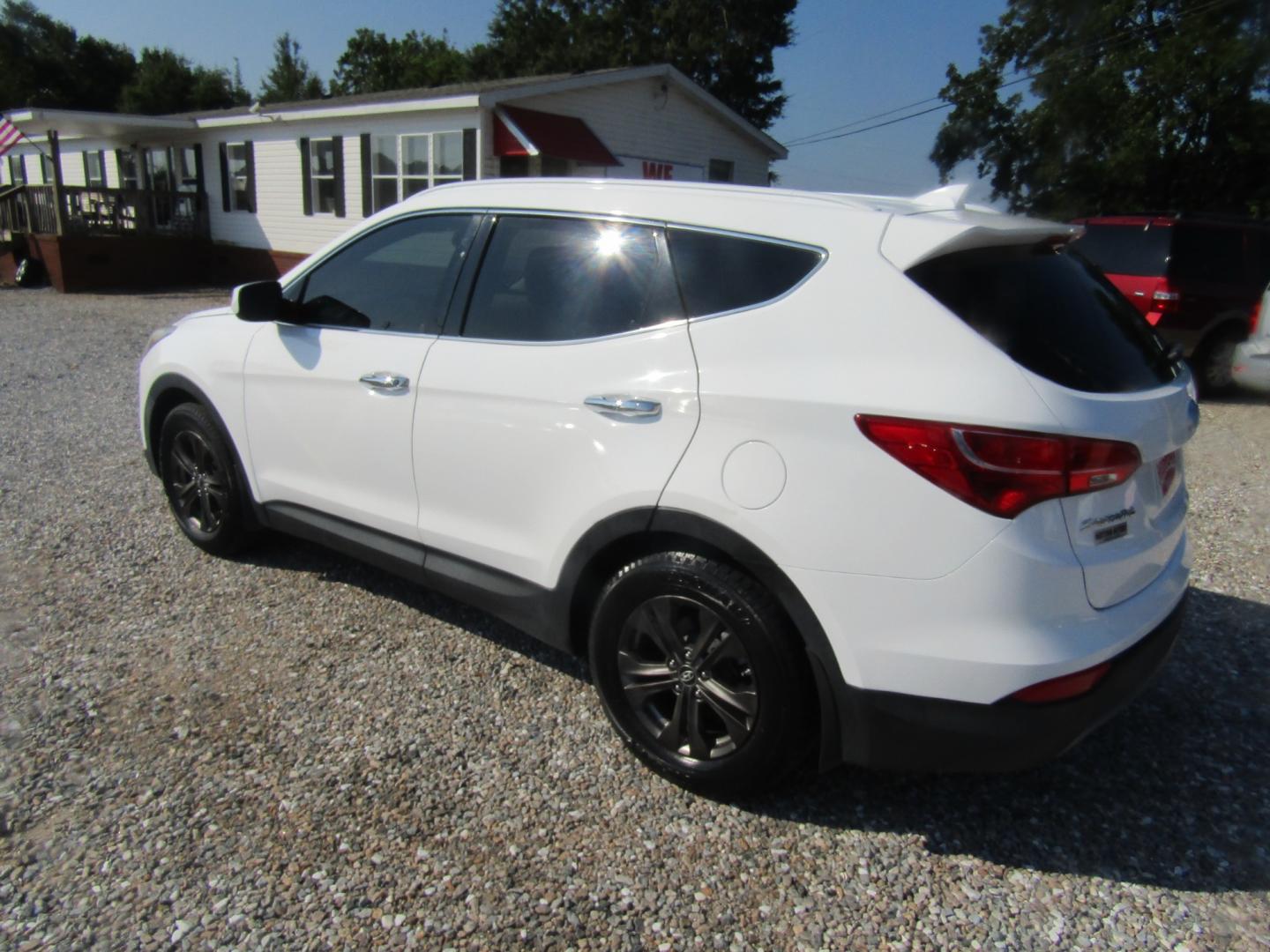 2014 White /Tan Hyundai Santa Fe Sport 2.4 FWD (5XYZU3LB5EG) with an 2.4L L4 DOHC 16V engine, Automatic transmission, located at 15016 S Hwy 231, Midland City, AL, 36350, (334) 983-3001, 31.306210, -85.495277 - Photo#5