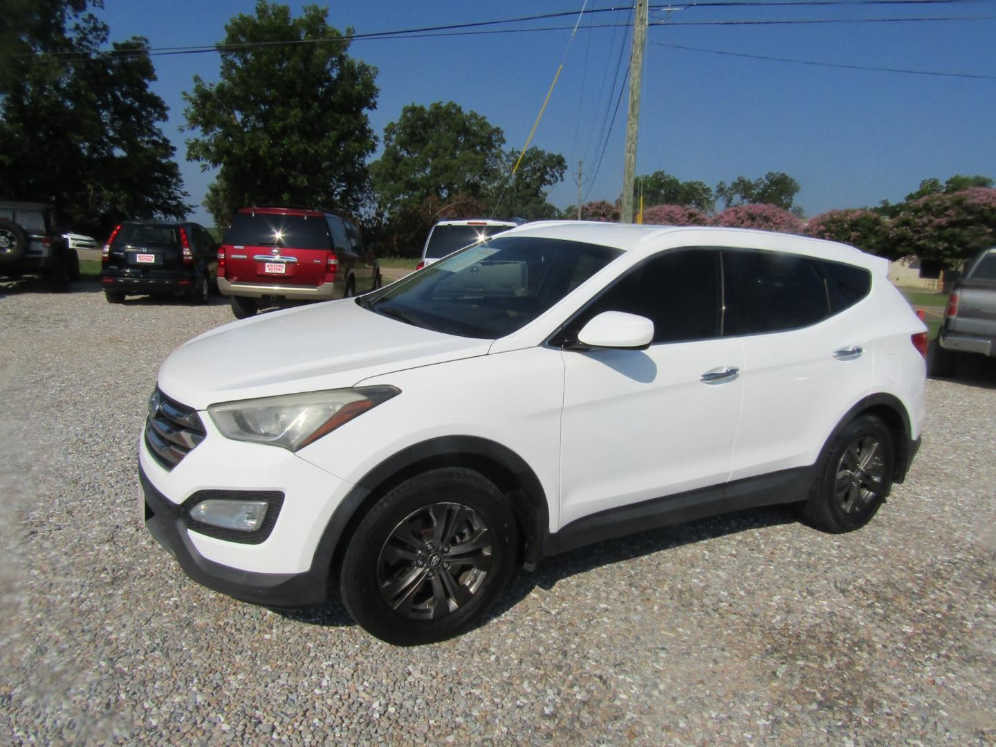 2014 White /Tan Hyundai Santa Fe Sport 2.4 FWD (5XYZU3LB5EG) with an 2.4L L4 DOHC 16V engine, Automatic transmission, located at 15016 S Hwy 231, Midland City, AL, 36350, (334) 983-3001, 31.306210, -85.495277 - Photo#2