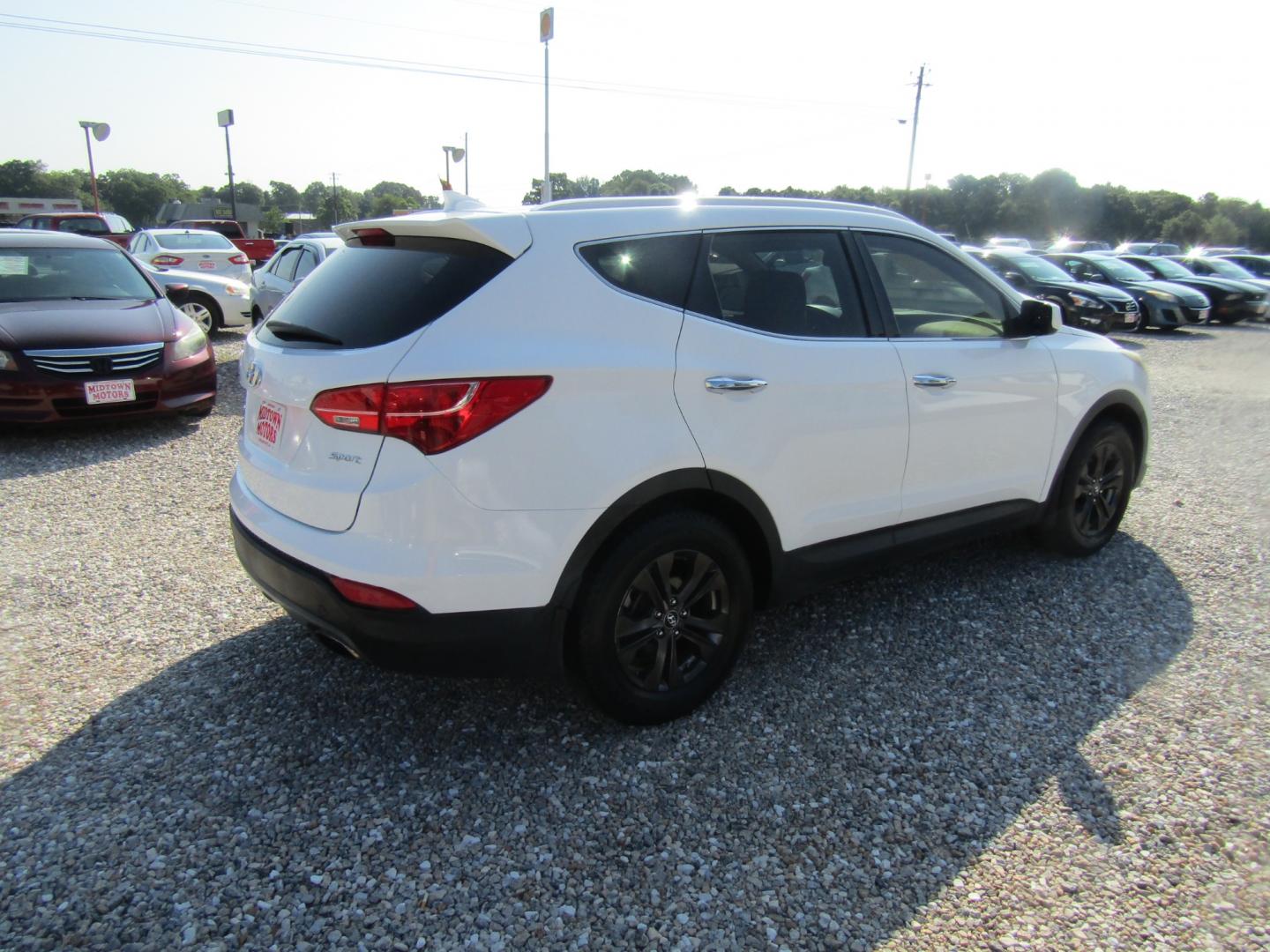 2014 White /Tan Hyundai Santa Fe Sport 2.4 FWD (5XYZU3LB5EG) with an 2.4L L4 DOHC 16V engine, Automatic transmission, located at 15016 S Hwy 231, Midland City, AL, 36350, (334) 983-3001, 31.306210, -85.495277 - Photo#7