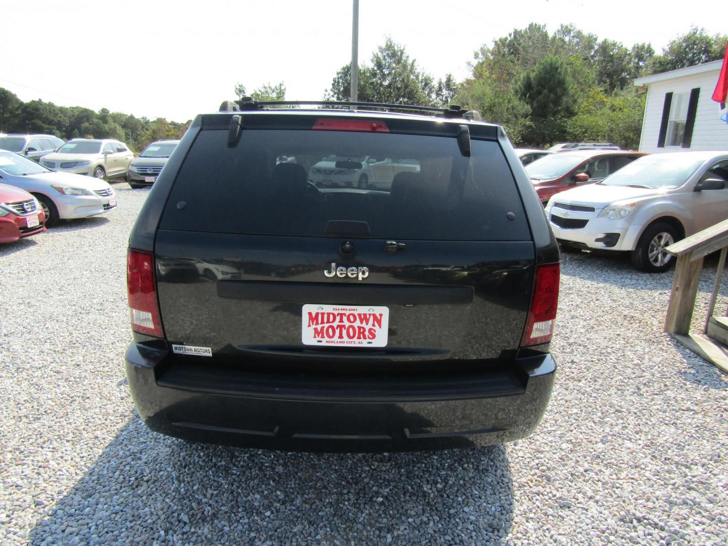 2009 Black /BLACK Jeep Grand Cherokee Laredo 2WD (1J8GS48K09C) with an 3.7L V6 SOHC 12V engine, Automatic transmission, located at 15016 S Hwy 231, Midland City, AL, 36350, (334) 983-3001, 31.306210, -85.495277 - Photo#6