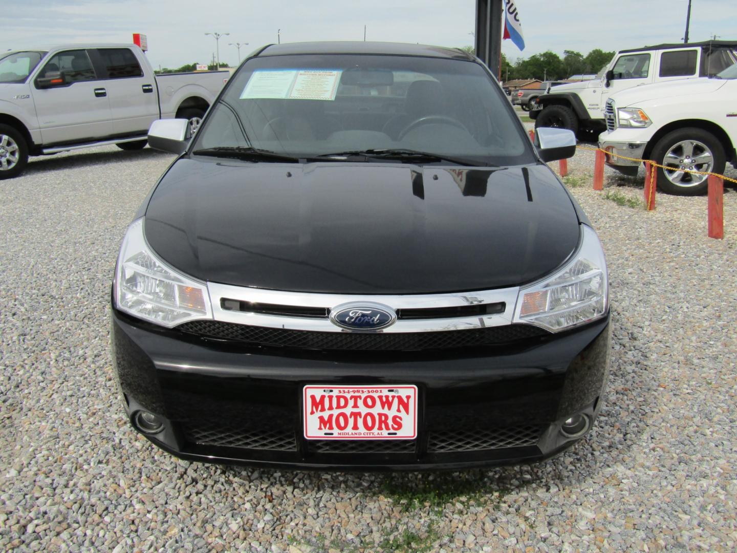 2008 Black /Black Ford Focus SES Sedan (1FAHP35N08W) with an 2.0L L4 DOHC 16V engine, Automatic transmission, located at 15016 S Hwy 231, Midland City, AL, 36350, (334) 983-3001, 31.306210, -85.495277 - Photo#1