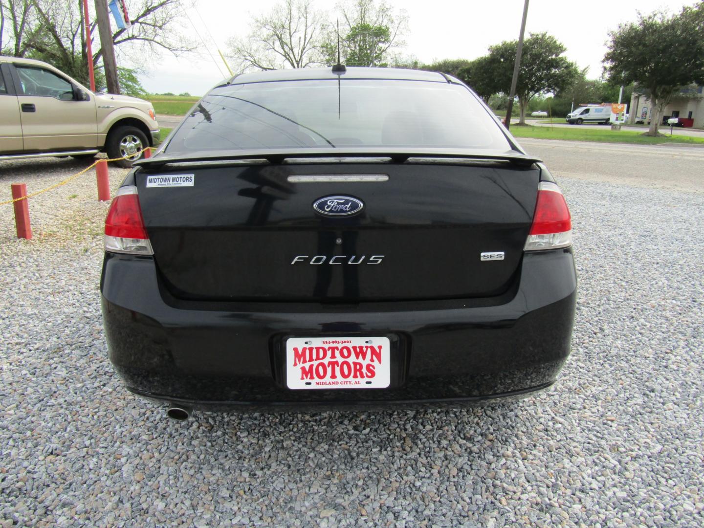 2008 Black /Black Ford Focus SES Sedan (1FAHP35N08W) with an 2.0L L4 DOHC 16V engine, Automatic transmission, located at 15016 S Hwy 231, Midland City, AL, 36350, (334) 983-3001, 31.306210, -85.495277 - Photo#6