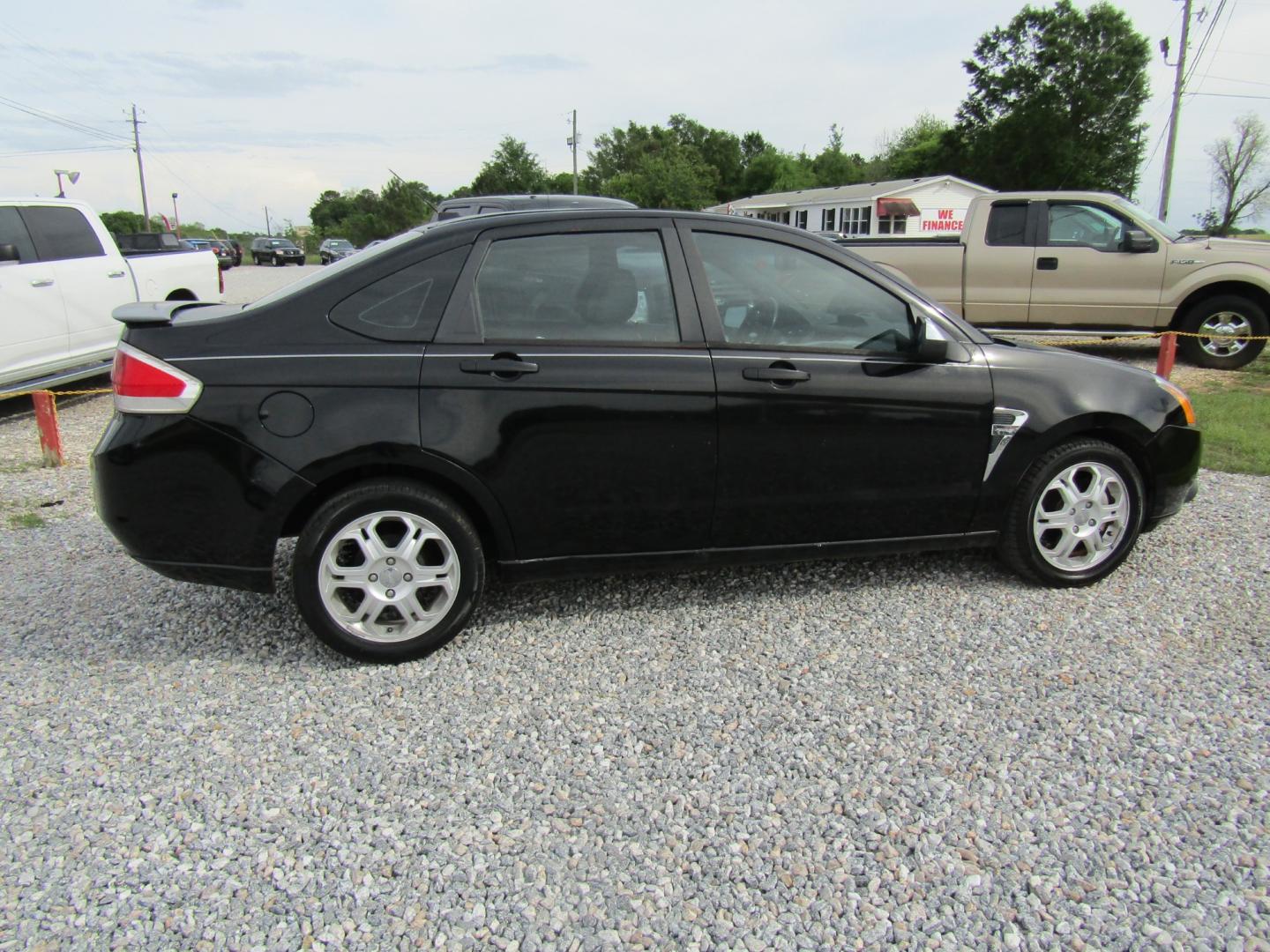 2008 Black /Black Ford Focus SES Sedan (1FAHP35N08W) with an 2.0L L4 DOHC 16V engine, Automatic transmission, located at 15016 S Hwy 231, Midland City, AL, 36350, (334) 983-3001, 31.306210, -85.495277 - Photo#7