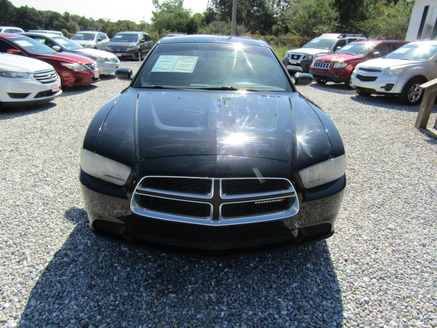 2013 Black /Black Dodge Charger SE (2C3CDXBG1DH) with an 3.6L V6 DOHC 24V engine, Automatic transmission, located at 15016 S Hwy 231, Midland City, AL, 36350, (334) 983-3001, 31.306210, -85.495277 - Photo#1