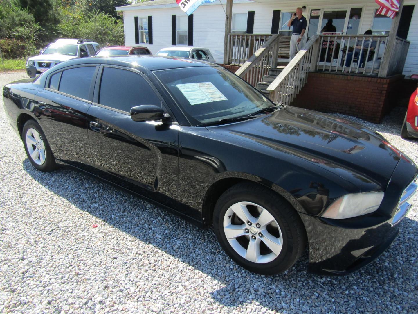 2013 Black /Black Dodge Charger SE (2C3CDXBG1DH) with an 3.6L V6 DOHC 24V engine, Automatic transmission, located at 15016 S Hwy 231, Midland City, AL, 36350, (334) 983-3001, 31.306210, -85.495277 - Photo#0