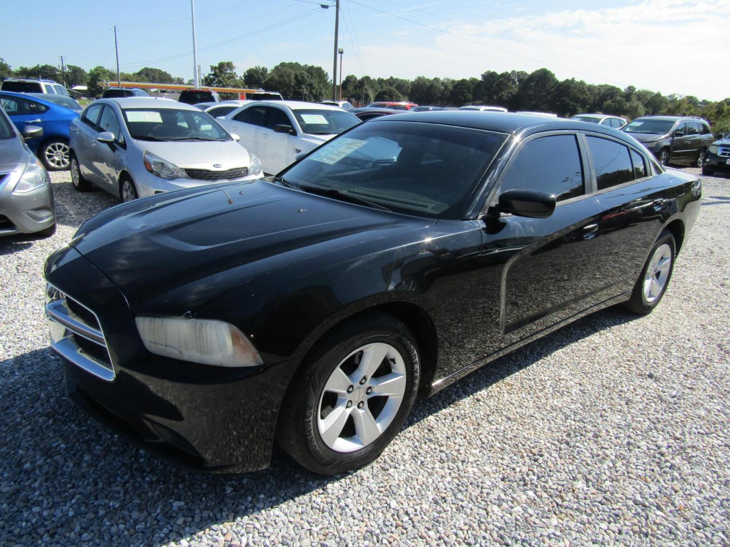 2013 Black /Black Dodge Charger SE (2C3CDXBG1DH) with an 3.6L V6 DOHC 24V engine, Automatic transmission, located at 15016 S Hwy 231, Midland City, AL, 36350, (334) 983-3001, 31.306210, -85.495277 - Photo#2