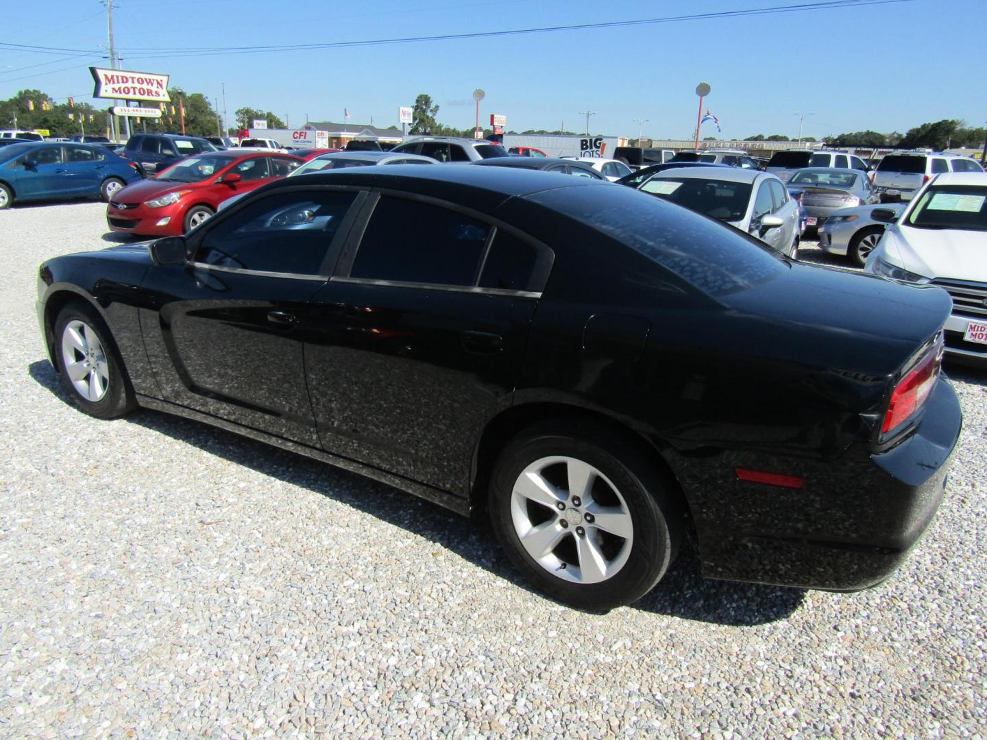 2013 Black /Black Dodge Charger SE (2C3CDXBG1DH) with an 3.6L V6 DOHC 24V engine, Automatic transmission, located at 15016 S Hwy 231, Midland City, AL, 36350, (334) 983-3001, 31.306210, -85.495277 - Photo#5