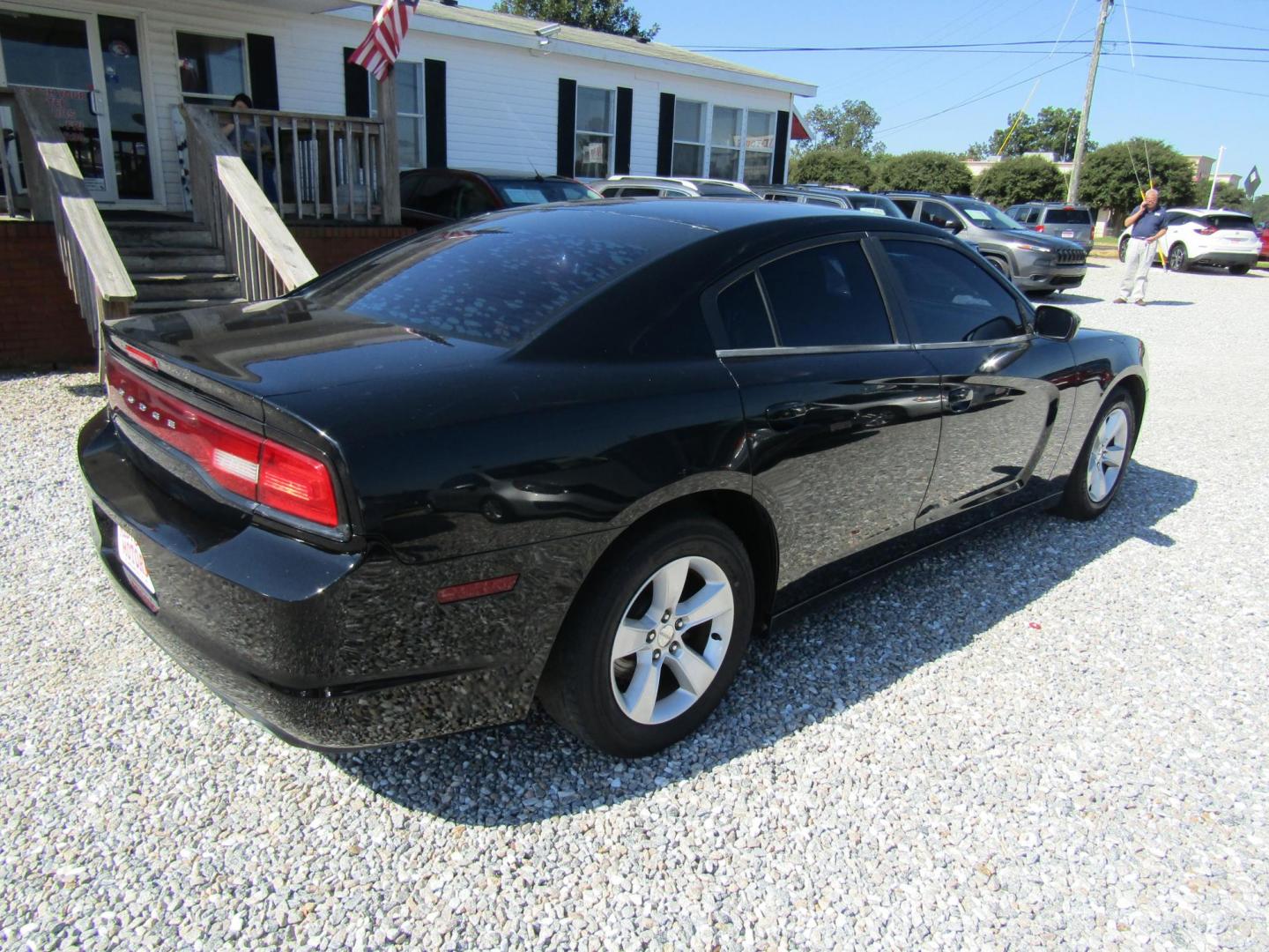 2013 Black /Black Dodge Charger SE (2C3CDXBG1DH) with an 3.6L V6 DOHC 24V engine, Automatic transmission, located at 15016 S Hwy 231, Midland City, AL, 36350, (334) 983-3001, 31.306210, -85.495277 - Photo#7