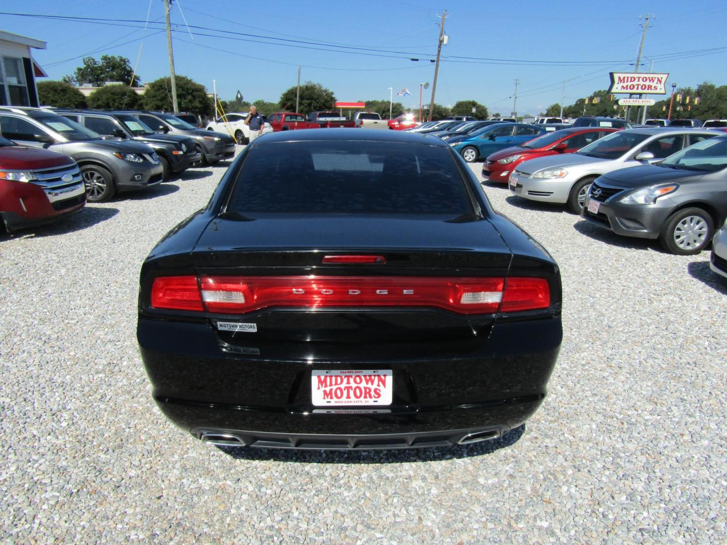 2013 Black /Black Dodge Charger SE (2C3CDXBG1DH) with an 3.6L V6 DOHC 24V engine, Automatic transmission, located at 15016 S Hwy 231, Midland City, AL, 36350, (334) 983-3001, 31.306210, -85.495277 - Photo#6