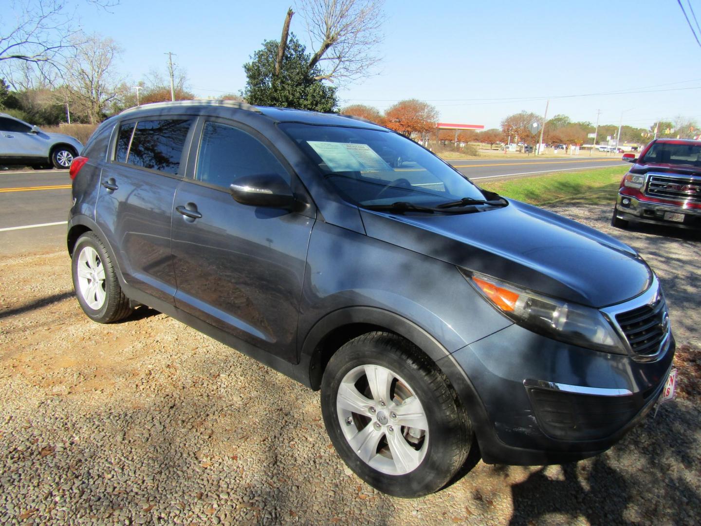 2012 Blue /Black Kia Sportage LX FWD (KNDPB3A2XC7) with an 2.4L V6 DOHC 24V engine, Automatic transmission, located at 15016 S Hwy 231, Midland City, AL, 36350, (334) 983-3001, 31.306210, -85.495277 - Photo#0