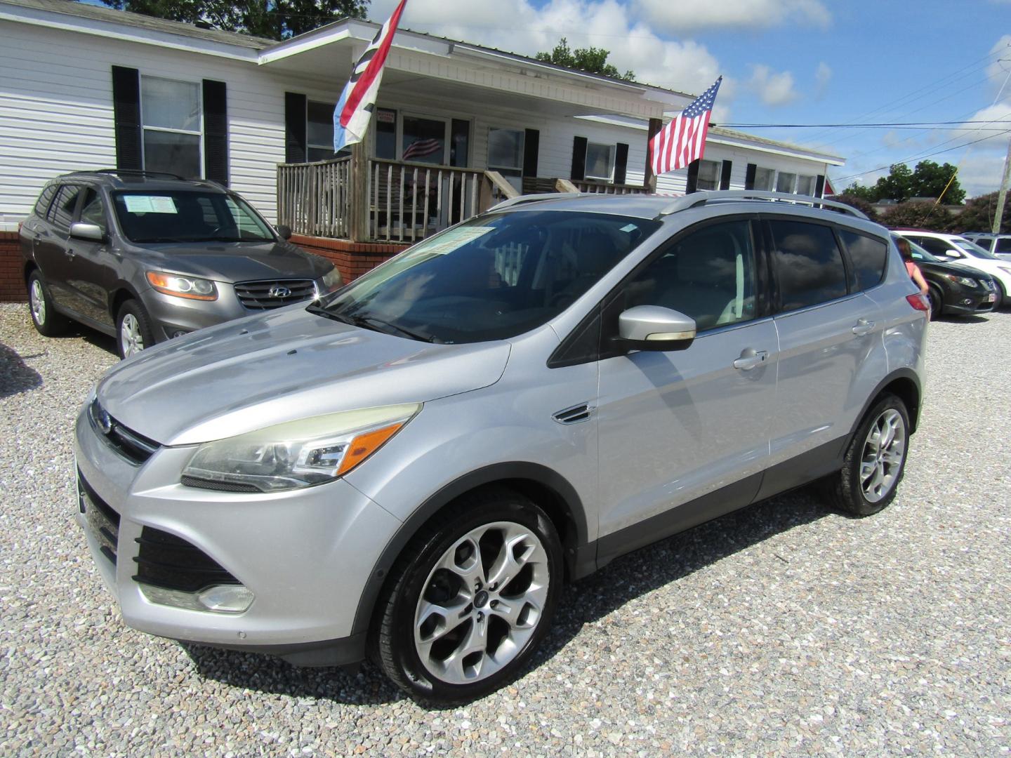 2014 Silver /Gray Ford Escape Titanium FWD (1FMCU0J96EU) with an 2.0L L4 DOHC 16V engine, Automatic transmission, located at 15016 S Hwy 231, Midland City, AL, 36350, (334) 983-3001, 31.306210, -85.495277 - Photo#2