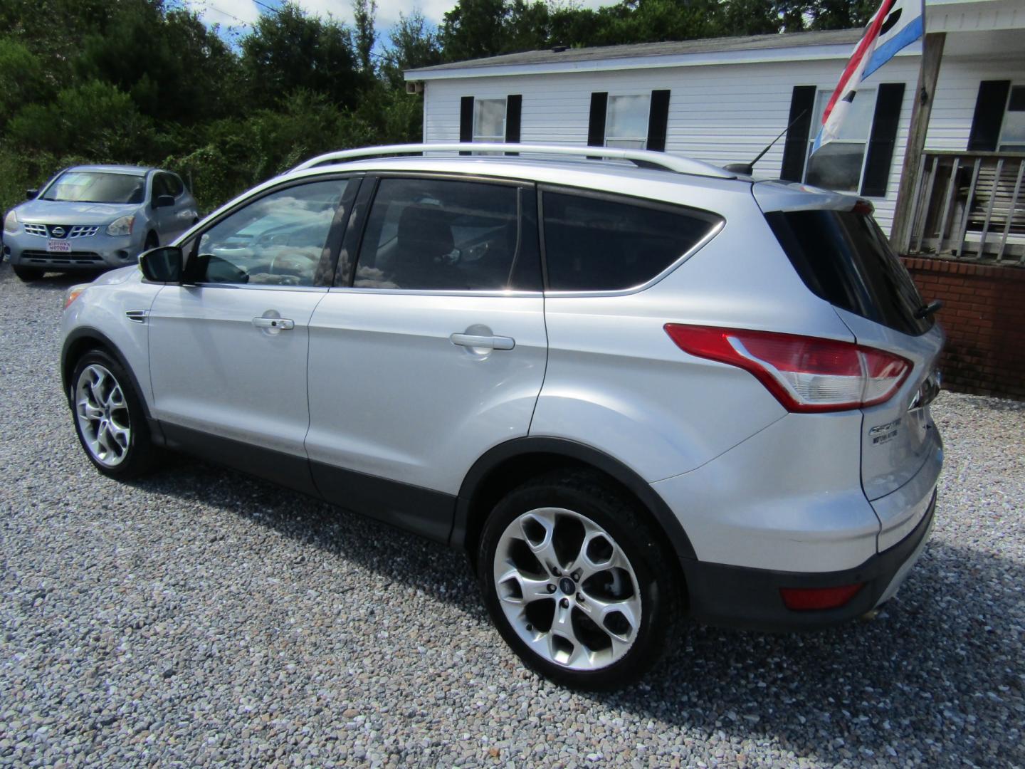 2014 Silver /Gray Ford Escape Titanium FWD (1FMCU0J96EU) with an 2.0L L4 DOHC 16V engine, Automatic transmission, located at 15016 S Hwy 231, Midland City, AL, 36350, (334) 983-3001, 31.306210, -85.495277 - Photo#5