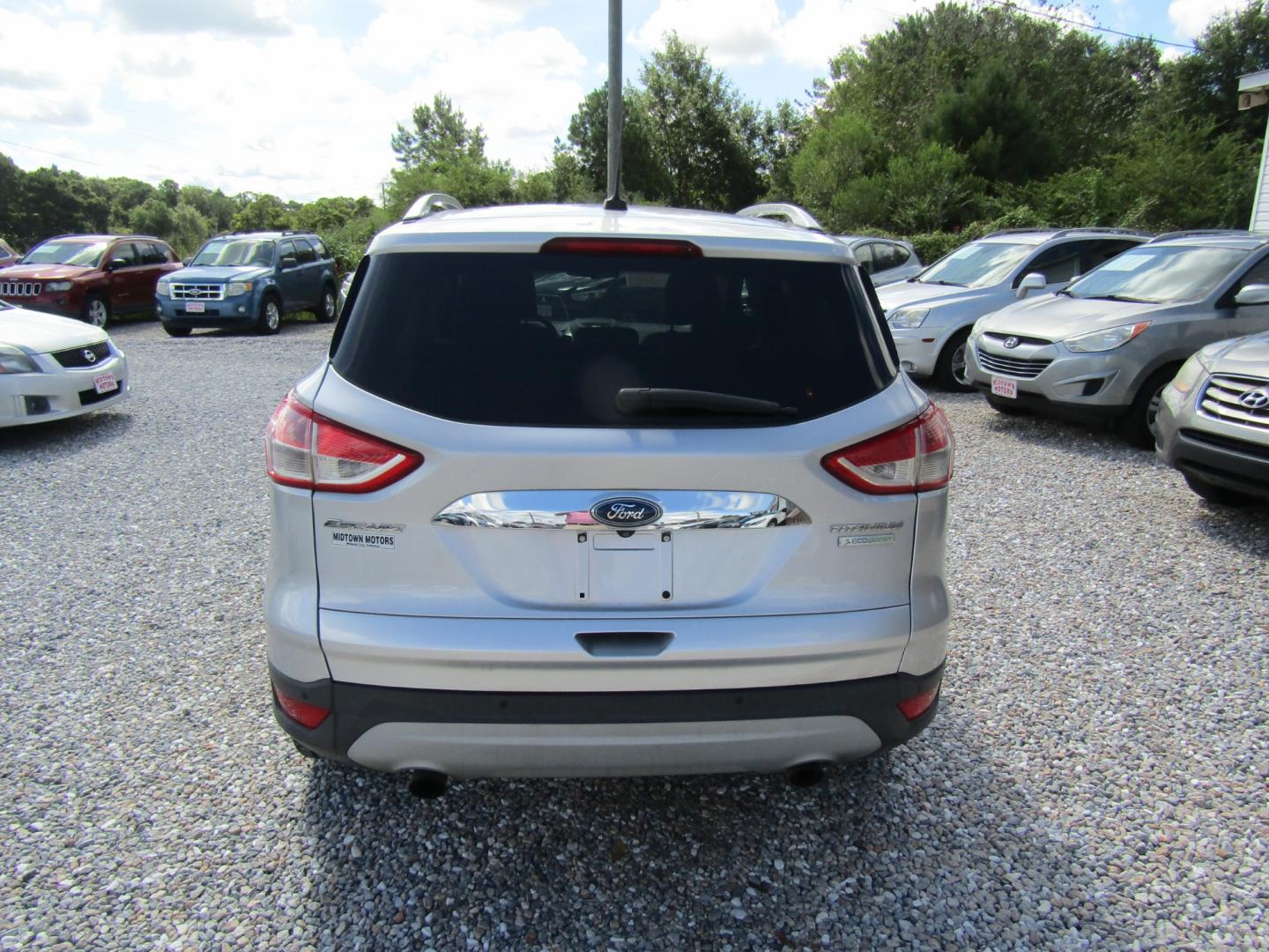 2014 Silver /Gray Ford Escape Titanium FWD (1FMCU0J96EU) with an 2.0L L4 DOHC 16V engine, Automatic transmission, located at 15016 S Hwy 231, Midland City, AL, 36350, (334) 983-3001, 31.306210, -85.495277 - Photo#6