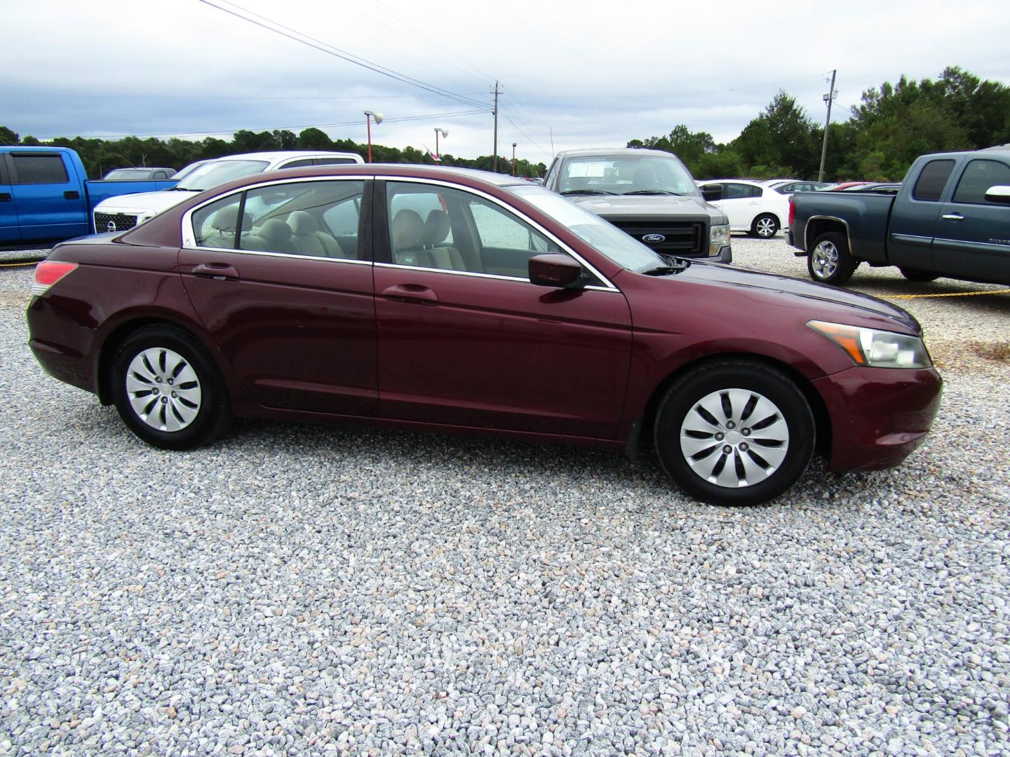 2009 Burgandy /Tan Honda Accord LX Sedan AT (1HGCP263X9A) with an 2.4L L4 DOHC 16V engine, Automatic transmission, located at 15016 S Hwy 231, Midland City, AL, 36350, (334) 983-3001, 31.306210, -85.495277 - Photo#0