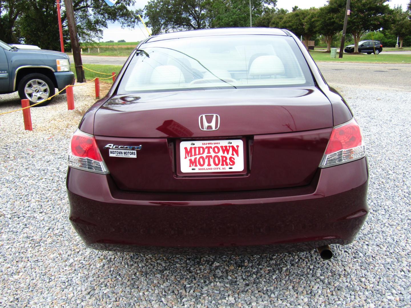 2009 Burgandy /Tan Honda Accord LX Sedan AT (1HGCP263X9A) with an 2.4L L4 DOHC 16V engine, Automatic transmission, located at 15016 S Hwy 231, Midland City, AL, 36350, (334) 983-3001, 31.306210, -85.495277 - Photo#5