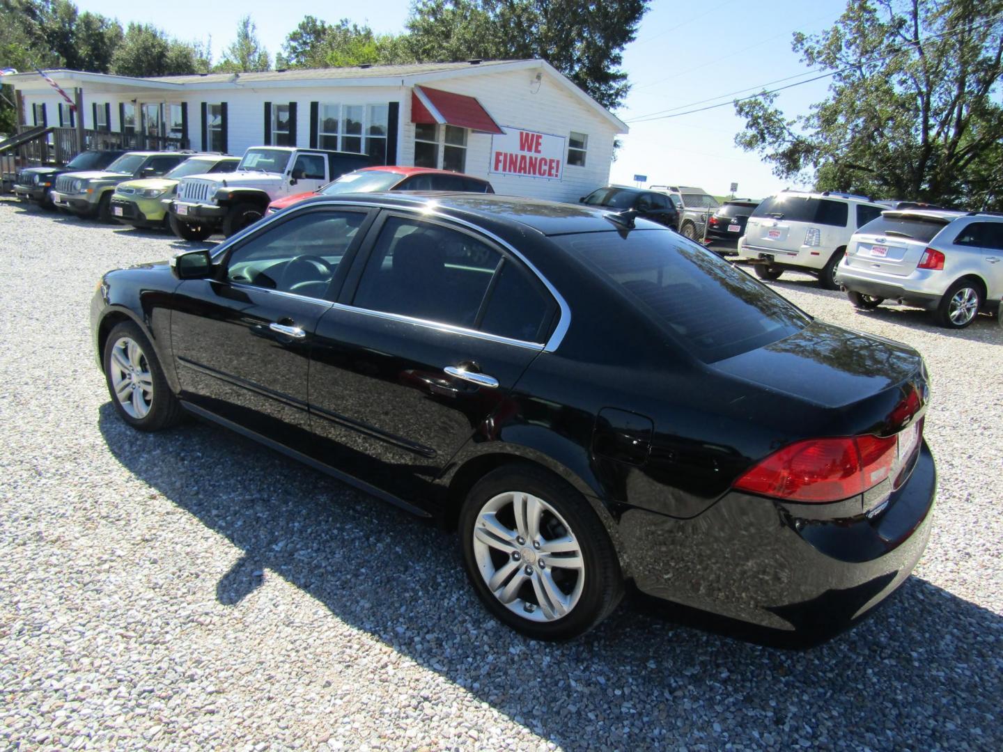 2009 Black /Gray Kia Optima EX (KNAGE228495) with an 2.4L L4 DOHC 16V engine, Automatic transmission, located at 15016 S Hwy 231, Midland City, AL, 36350, (334) 983-3001, 31.306210, -85.495277 - Photo#7