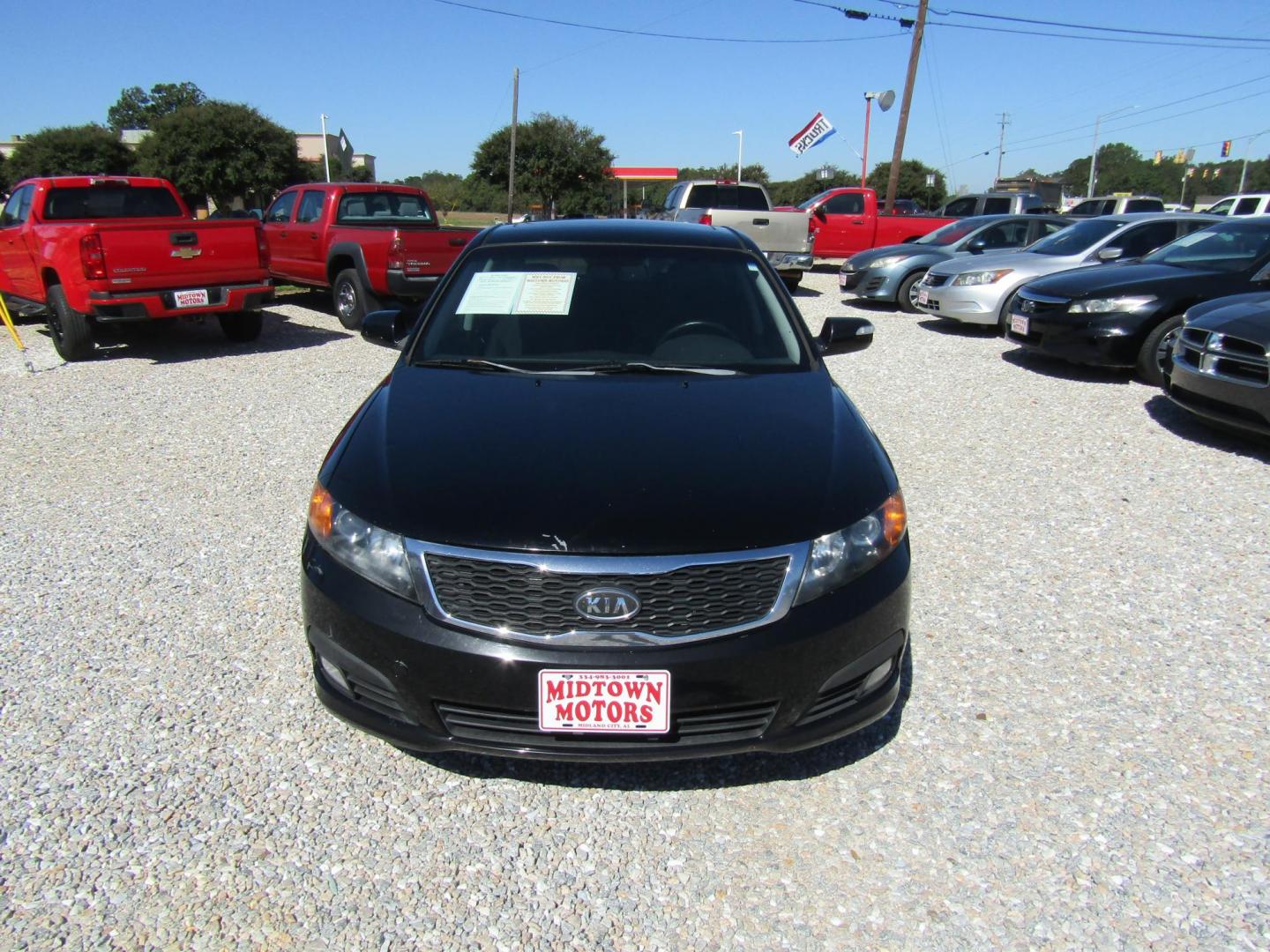 2009 Black /Gray Kia Optima EX (KNAGE228495) with an 2.4L L4 DOHC 16V engine, Automatic transmission, located at 15016 S Hwy 231, Midland City, AL, 36350, (334) 983-3001, 31.306210, -85.495277 - Photo#1