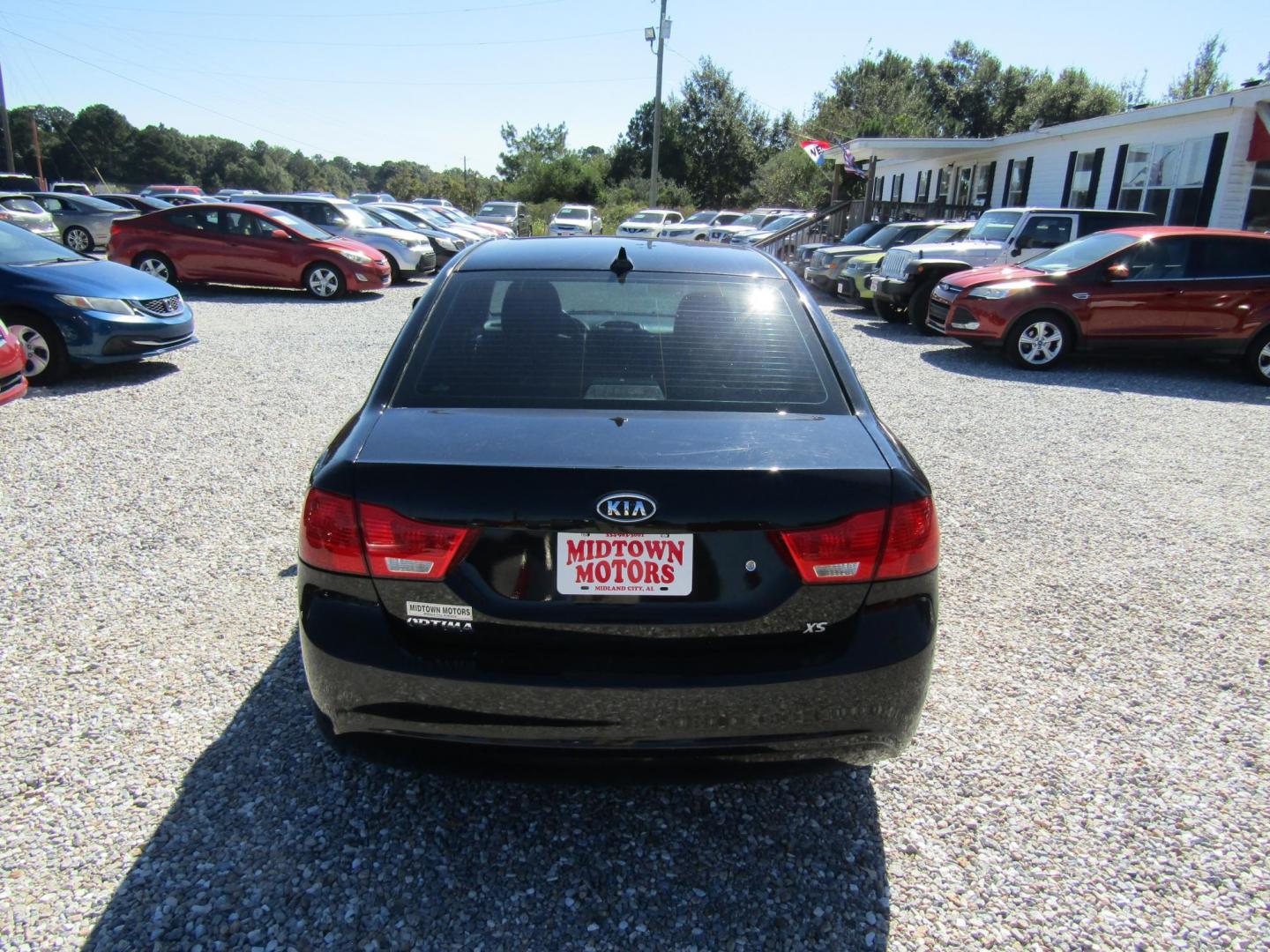 2009 Black /Gray Kia Optima EX (KNAGE228495) with an 2.4L L4 DOHC 16V engine, Automatic transmission, located at 15016 S Hwy 231, Midland City, AL, 36350, (334) 983-3001, 31.306210, -85.495277 - Photo#6