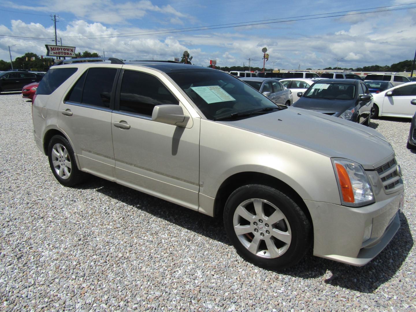 2008 Tan /Tan Cadillac SRX V6 (1GYEE637080) with an 3.6L V6 OHV 24V engine, Automatic transmission, located at 15016 S Hwy 231, Midland City, AL, 36350, (334) 983-3001, 31.306210, -85.495277 - Photo#0