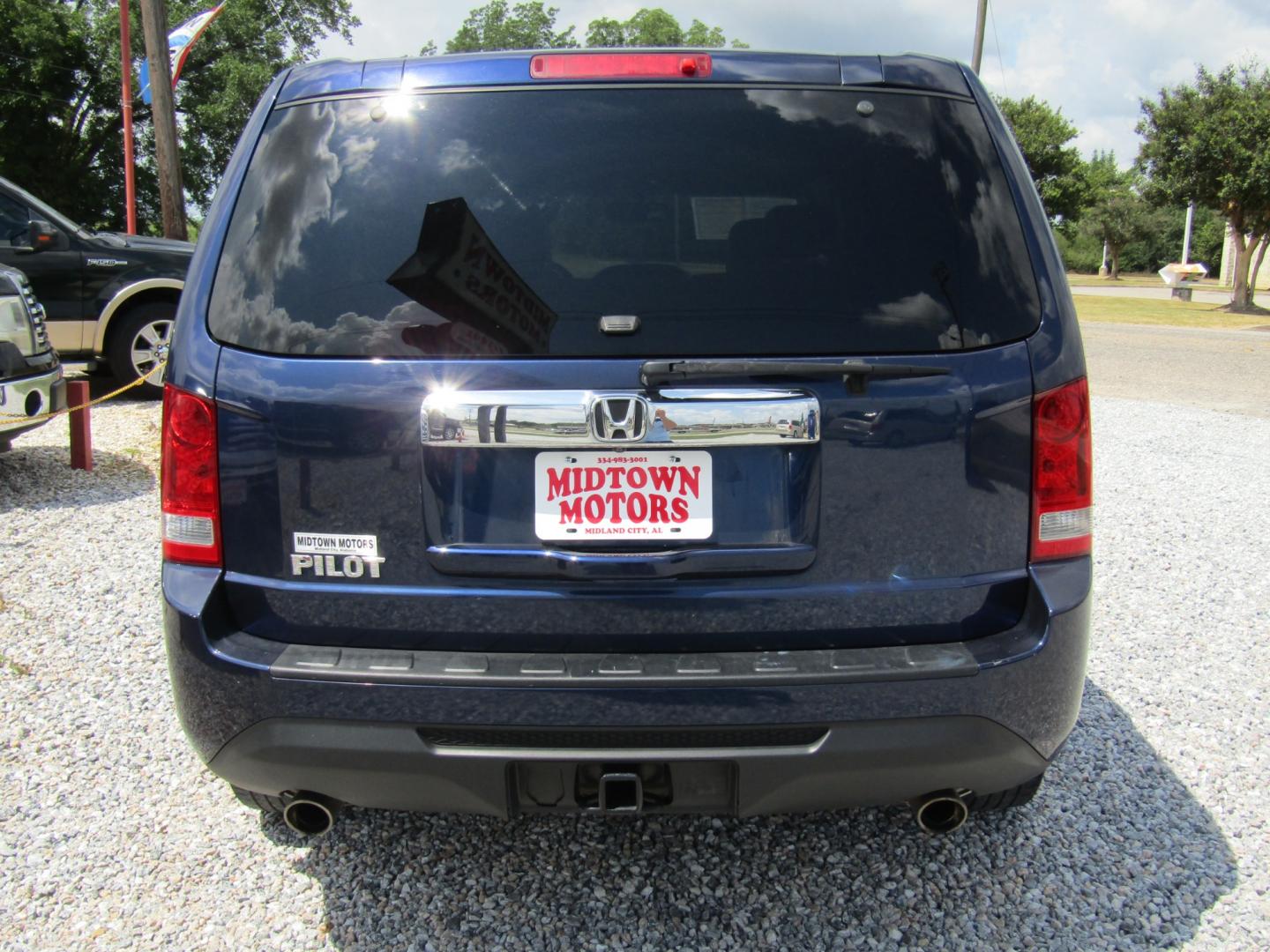 2013 Blue /Gray Honda Pilot EX-L 2WD 5-Spd AT (5FNYF3H54DB) with an 3.5L V6 SOHC 24V engine, Automatic transmission, located at 15016 S Hwy 231, Midland City, AL, 36350, (334) 983-3001, 31.306210, -85.495277 - Photo#5