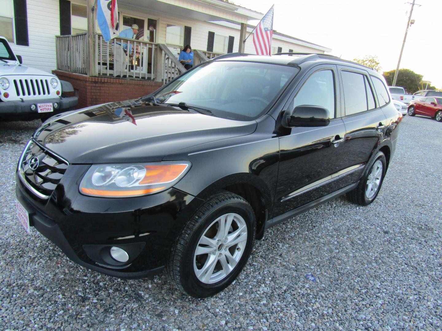 2011 Black /Black Hyundai Santa Fe Limited 3.5 FWD (5XYZK4AG4BG) with an 3.5L V6 DOHC 24V engine, Automatic transmission, located at 15016 S Hwy 231, Midland City, AL, 36350, (334) 983-3001, 31.306210, -85.495277 - Photo#1