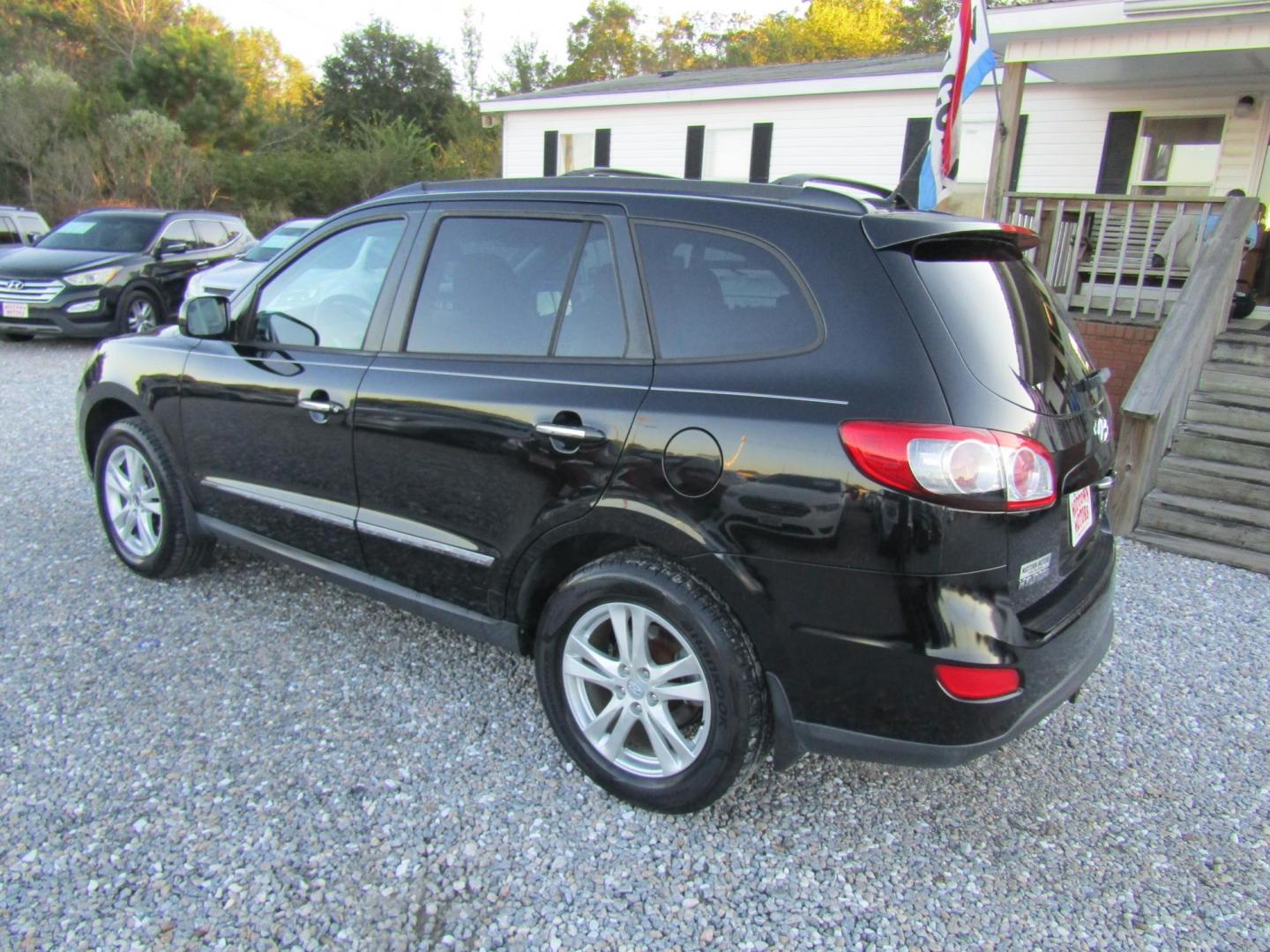 2011 Black /Black Hyundai Santa Fe Limited 3.5 FWD (5XYZK4AG4BG) with an 3.5L V6 DOHC 24V engine, Automatic transmission, located at 15016 S Hwy 231, Midland City, AL, 36350, (334) 983-3001, 31.306210, -85.495277 - Photo#6