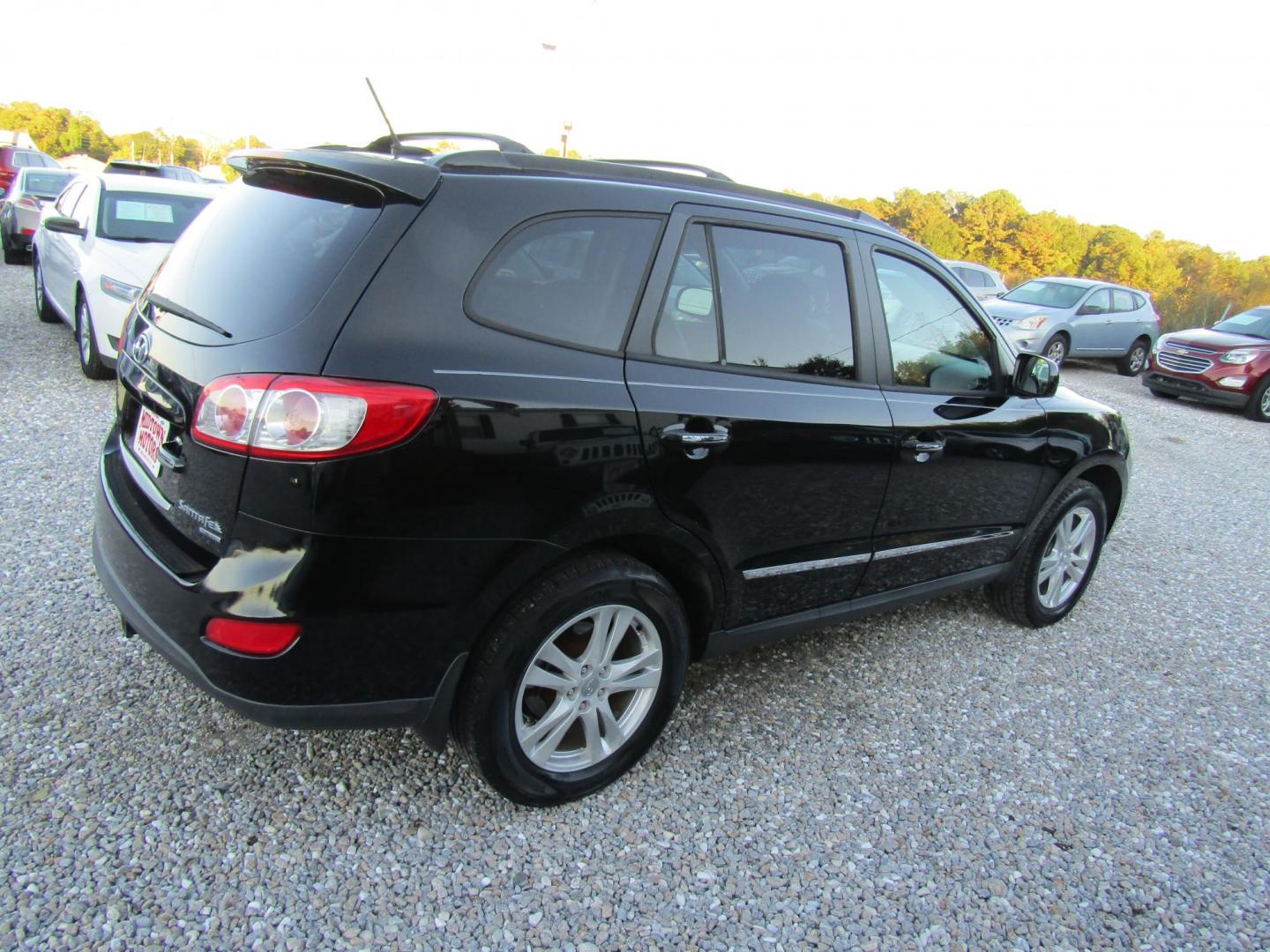 2011 Black /Black Hyundai Santa Fe Limited 3.5 FWD (5XYZK4AG4BG) with an 3.5L V6 DOHC 24V engine, Automatic transmission, located at 15016 S Hwy 231, Midland City, AL, 36350, (334) 983-3001, 31.306210, -85.495277 - Photo#7