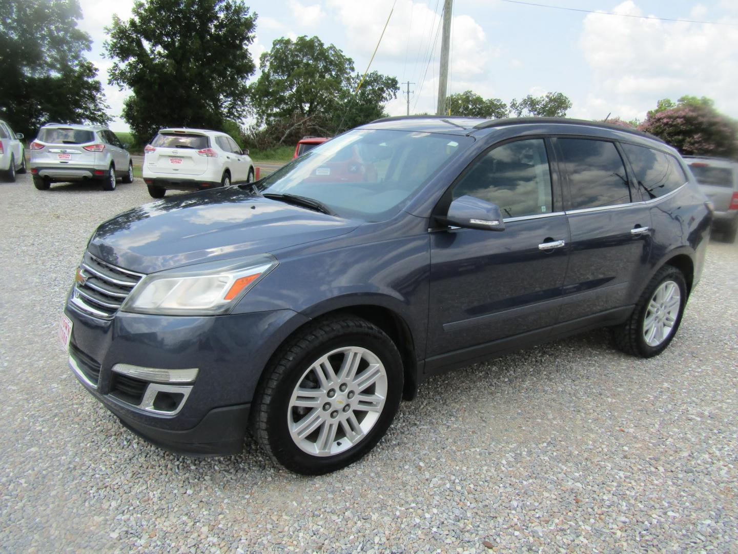 2014 Blue Chevrolet Traverse 1LT FWD (1GNKRGKD4EJ) with an 3.6L V6 DOHC 24V engine, Automatic transmission, located at 15016 S Hwy 231, Midland City, AL, 36350, (334) 983-3001, 31.306210, -85.495277 - Photo#4