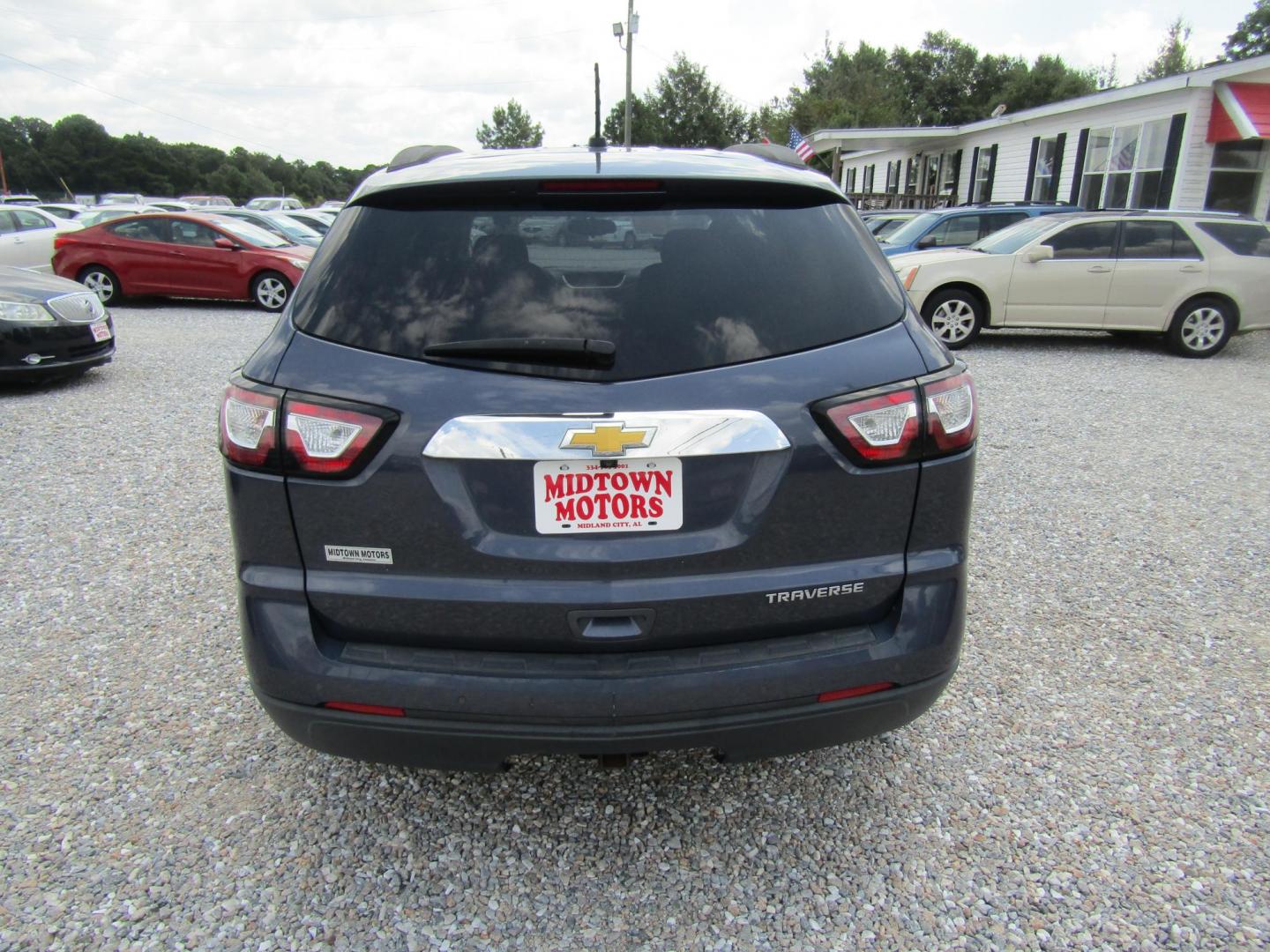 2014 Blue Chevrolet Traverse 1LT FWD (1GNKRGKD4EJ) with an 3.6L V6 DOHC 24V engine, Automatic transmission, located at 15016 S Hwy 231, Midland City, AL, 36350, (334) 983-3001, 31.306210, -85.495277 - Photo#5