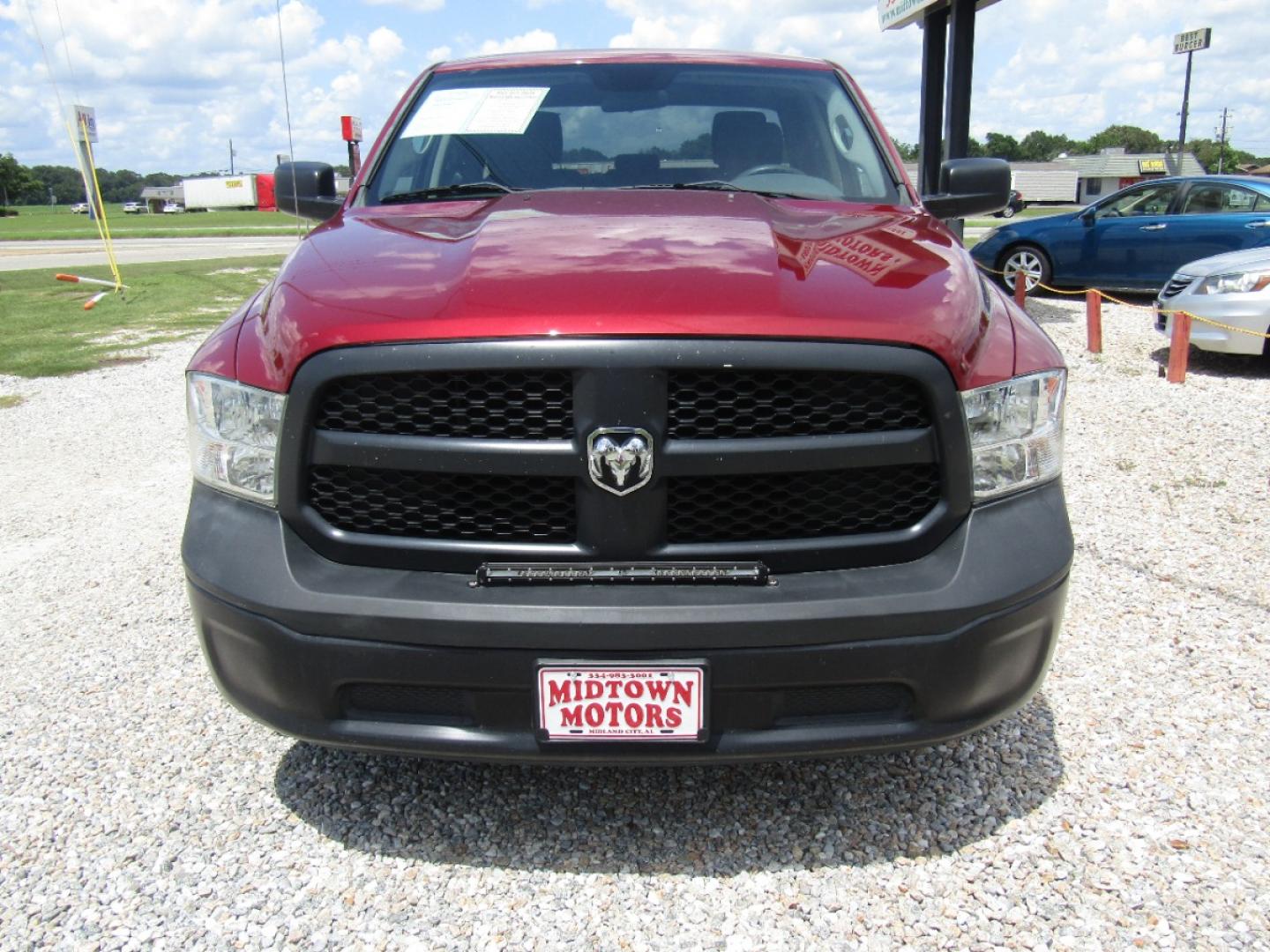 2013 Maroon /Black RAM 1500 Tradesman Quad Cab 2WD (1C6RR6FP3DS) with an 4.7L V8 SOHC 16V engine, Automatic transmission, located at 15016 S Hwy 231, Midland City, AL, 36350, (334) 983-3001, 31.306210, -85.495277 - Photo#1