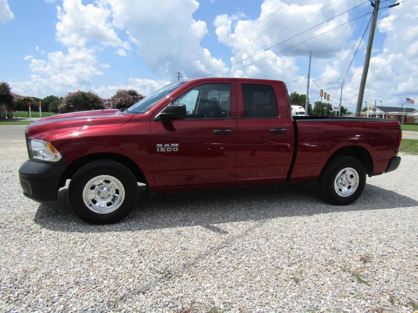 2013 Maroon /Black RAM 1500 Tradesman Quad Cab 2WD (1C6RR6FP3DS) with an 4.7L V8 SOHC 16V engine, Automatic transmission, located at 15016 S Hwy 231, Midland City, AL, 36350, (334) 983-3001, 31.306210, -85.495277 - Photo#2