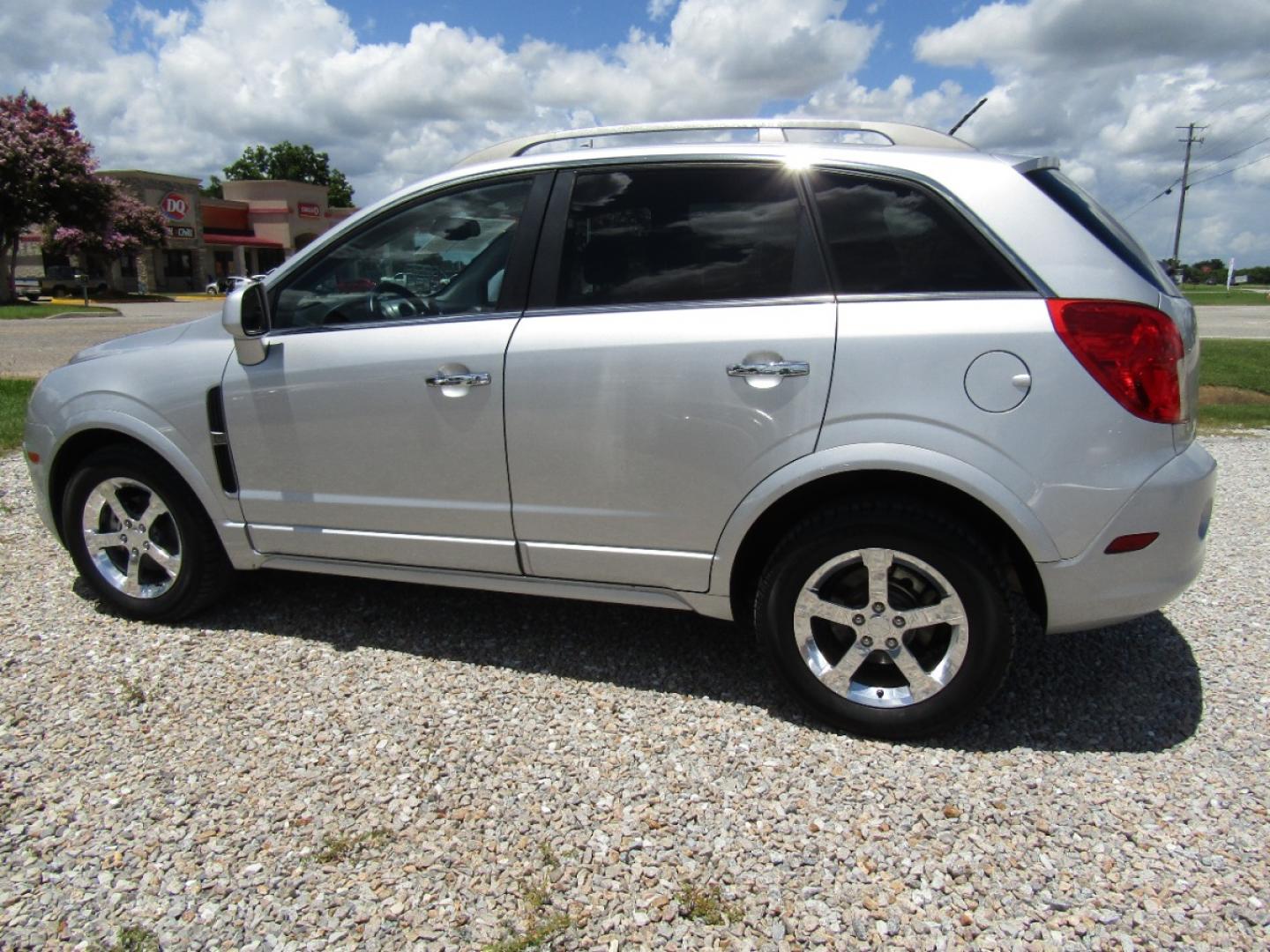 2013 Silver Chevrolet Captiva Sport 1LT FWD (3GNAL3EK6DS) with an 2.4L L4 DOHC 16V FFV engine, Automatic transmission, located at 15016 S Hwy 231, Midland City, AL, 36350, (334) 983-3001, 31.306210, -85.495277 - Photo#5