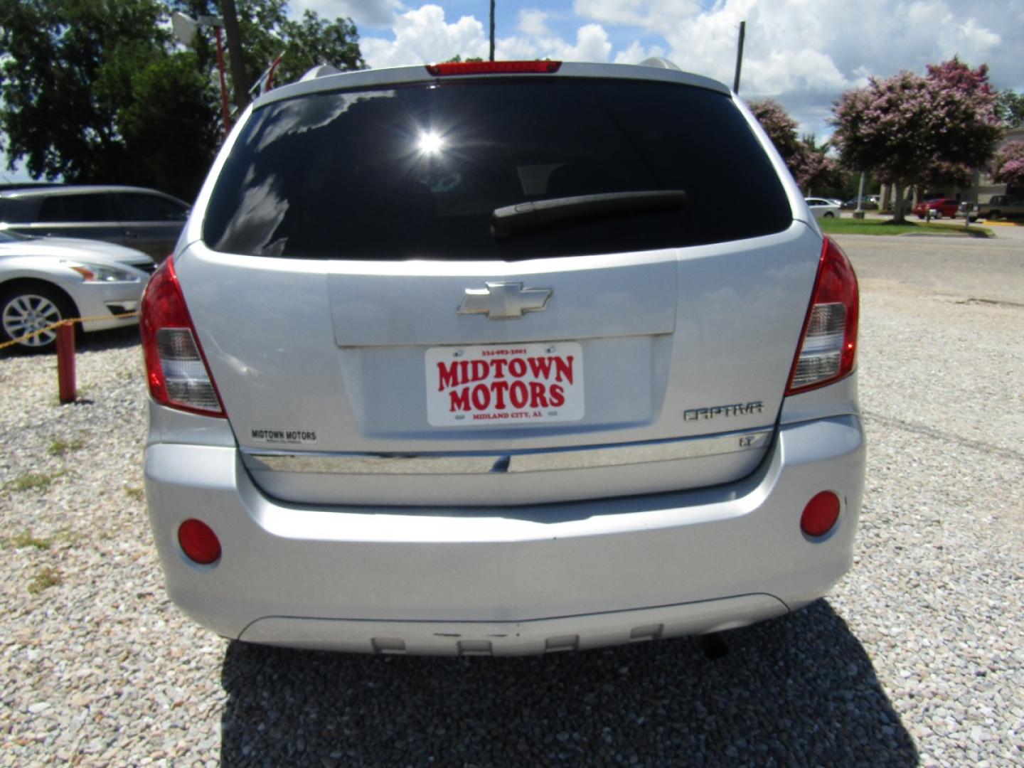 2013 Silver Chevrolet Captiva Sport 1LT FWD (3GNAL3EK6DS) with an 2.4L L4 DOHC 16V FFV engine, Automatic transmission, located at 15016 S Hwy 231, Midland City, AL, 36350, (334) 983-3001, 31.306210, -85.495277 - Photo#6