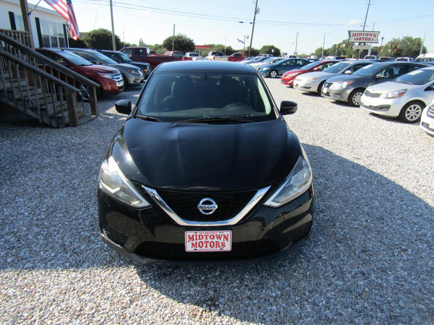 2016 Black Nissan Sentra FE+ S (3N1AB7AP0GL) with an 1.8L L4 SFI DOHC 16V engine, Automatic transmission, located at 15016 S Hwy 231, Midland City, AL, 36350, (334) 983-3001, 31.306210, -85.495277 - Photo#1