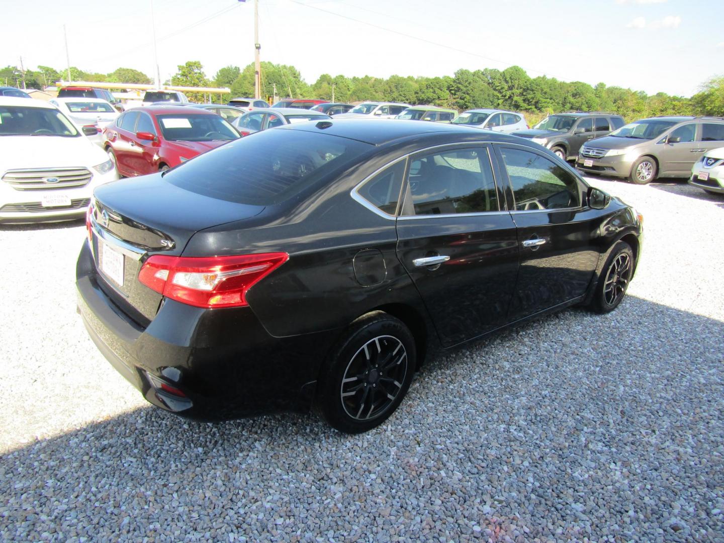 2016 Black Nissan Sentra FE+ S (3N1AB7AP0GL) with an 1.8L L4 SFI DOHC 16V engine, Automatic transmission, located at 15016 S Hwy 231, Midland City, AL, 36350, (334) 983-3001, 31.306210, -85.495277 - Photo#6