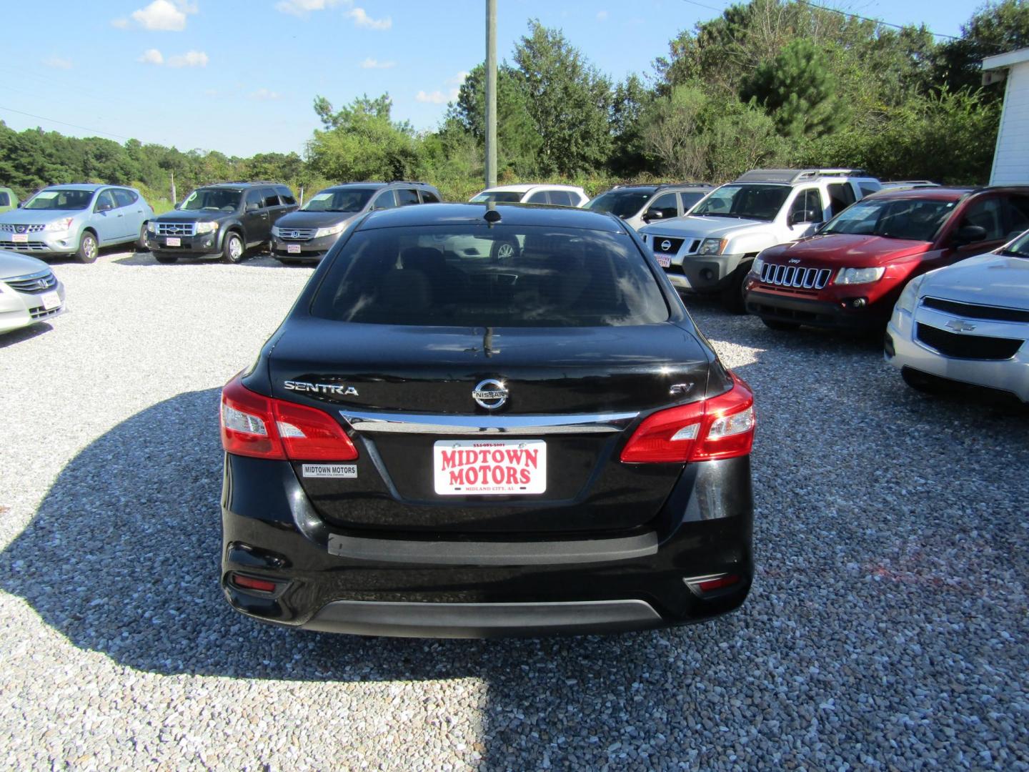 2016 Black Nissan Sentra FE+ S (3N1AB7AP0GL) with an 1.8L L4 SFI DOHC 16V engine, Automatic transmission, located at 15016 S Hwy 231, Midland City, AL, 36350, (334) 983-3001, 31.306210, -85.495277 - Photo#7