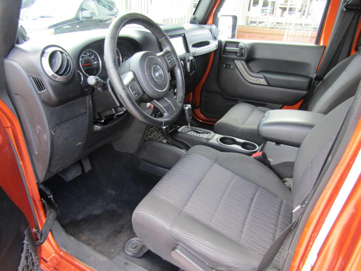 2011 Orange /Black Jeep Wrangler Unlimited Sport 4WD (1J4BA3H16BL) with an 3.8L V6 OHV 12V engine, Automatic transmission, located at 15016 S Hwy 231, Midland City, AL, 36350, (334) 983-3001, 31.306210, -85.495277 - Photo#3