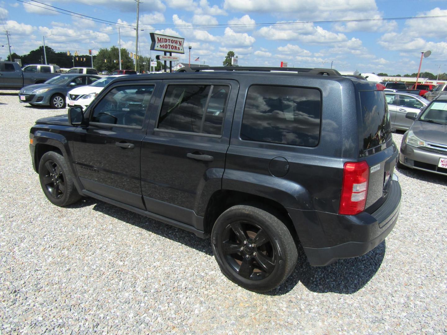 2014 Gray Jeep Patriot Sport 2WD (1C4NJPBA3ED) with an 2.0L L4 DOHC 16V engine, Automatic transmission, located at 15016 S Hwy 231, Midland City, AL, 36350, (334) 983-3001, 31.306210, -85.495277 - Photo#5