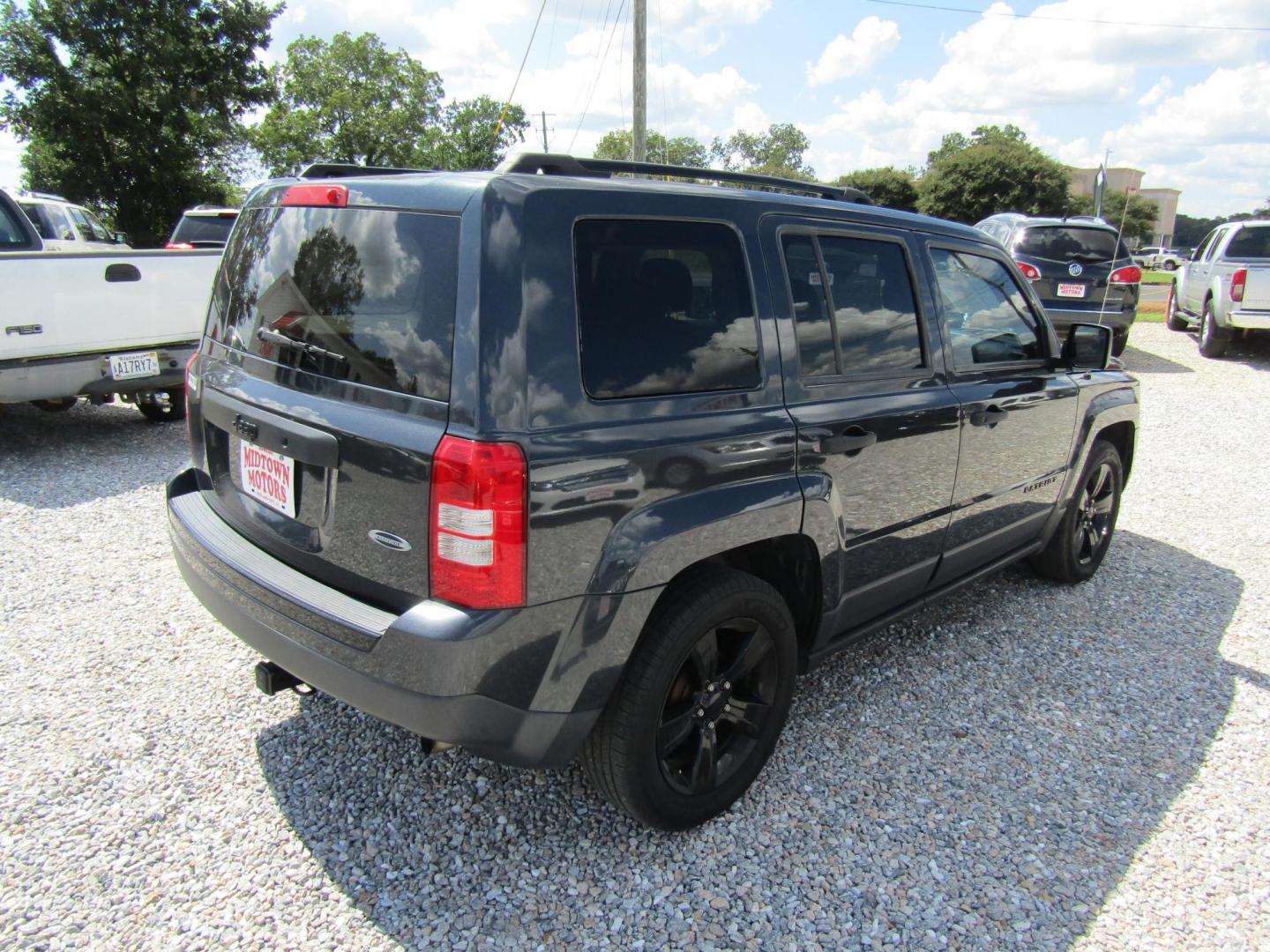 2014 Gray Jeep Patriot Sport 2WD (1C4NJPBA3ED) with an 2.0L L4 DOHC 16V engine, Automatic transmission, located at 15016 S Hwy 231, Midland City, AL, 36350, (334) 983-3001, 31.306210, -85.495277 - Photo#7