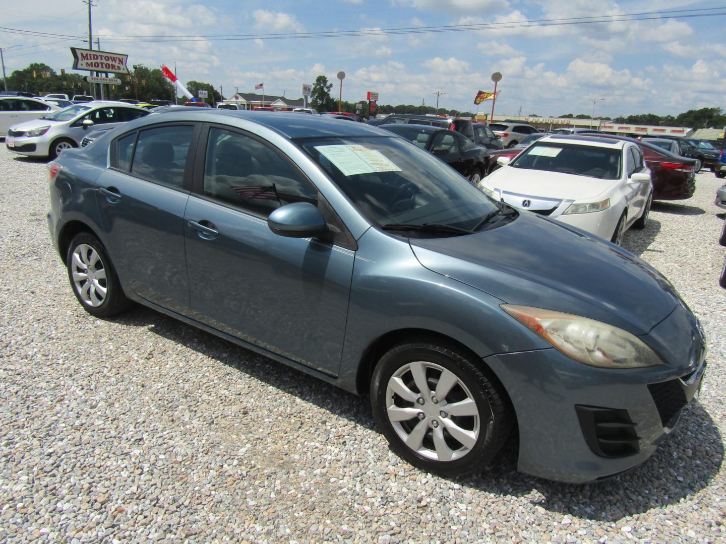 2011 Blue Mazda MAZDA3 i Sport 4-Door (JM1BL1UFXB1) with an 2.0L L4 DOHC 16V engine, Automatic transmission, located at 15016 S Hwy 231, Midland City, AL, 36350, (334) 983-3001, 31.306210, -85.495277 - Photo#0