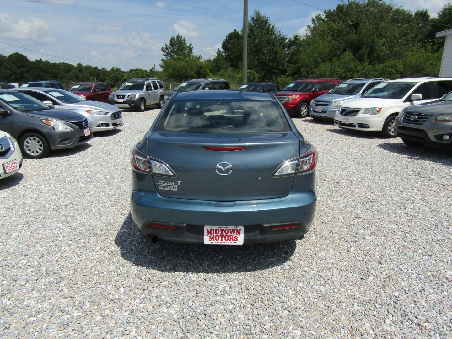 2011 Blue Mazda MAZDA3 i Sport 4-Door (JM1BL1UFXB1) with an 2.0L L4 DOHC 16V engine, Automatic transmission, located at 15016 S Hwy 231, Midland City, AL, 36350, (334) 983-3001, 31.306210, -85.495277 - Photo#6