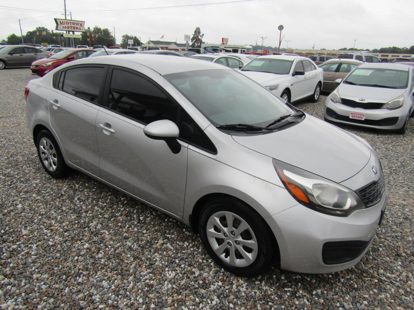 2014 Silver Kia Rio LX (KNADM4A31E6) with an 1.6L L4 DOHC 16V engine, Automatic transmission, located at 15016 S Hwy 231, Midland City, AL, 36350, (334) 983-3001, 31.306210, -85.495277 - Photo#0