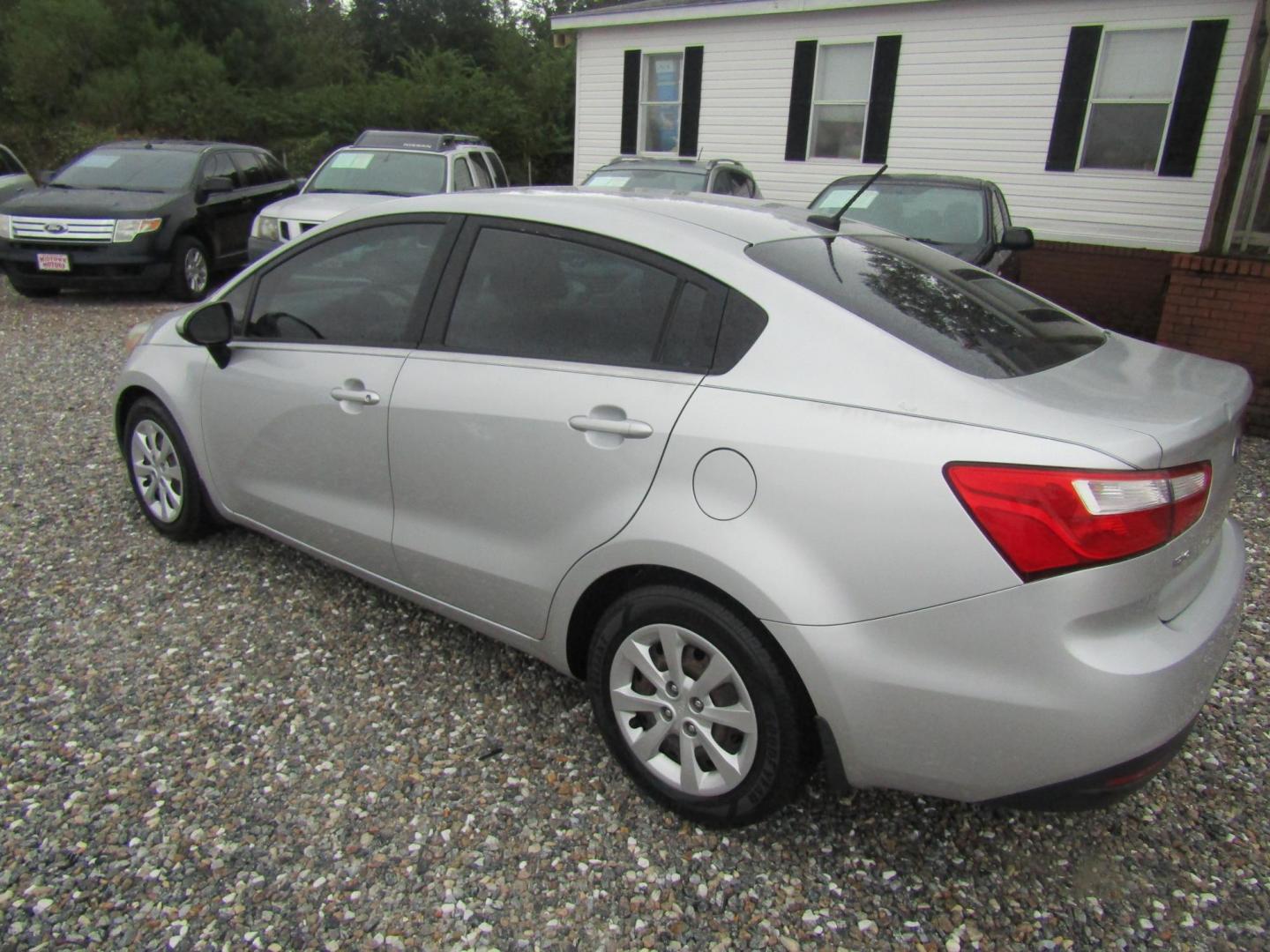 2014 Silver Kia Rio LX (KNADM4A31E6) with an 1.6L L4 DOHC 16V engine, Automatic transmission, located at 15016 S Hwy 231, Midland City, AL, 36350, (334) 983-3001, 31.306210, -85.495277 - Photo#5